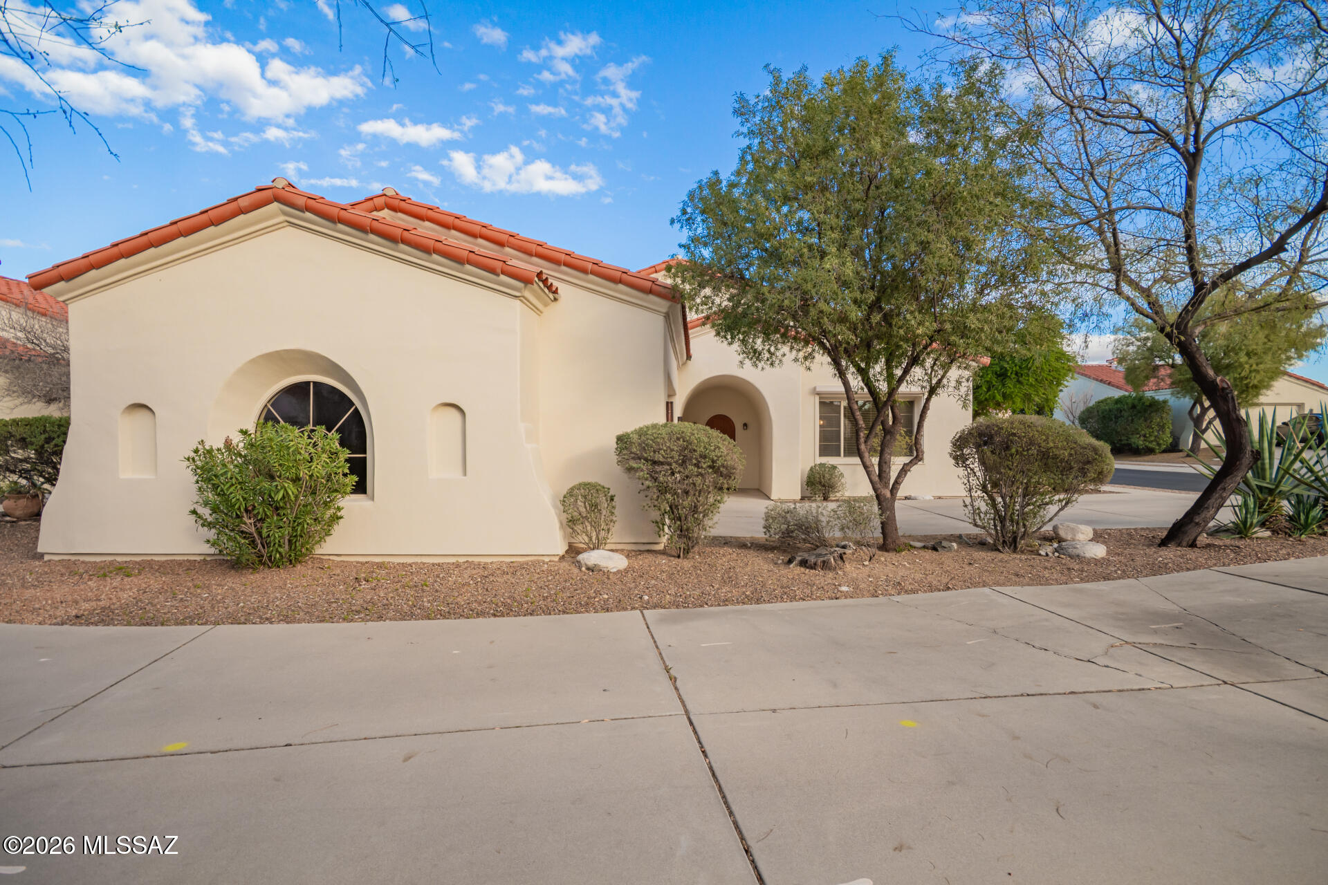 BEAUTIFULLY UPGRADED Spanish Colonial style home in the gated Vactor Ranch community, ready to move in! Providing 3 beds, 2 baths, 2-car garage, and a manicured landscape. The inviting interior showcases a welcoming foyer, fresh neutral palette, abundant natural light, and new wood-look tile flooring throughout. You'll love the large great room with a cozy fireplace niche, which seamlessly flows to the lovely dining space! The updated fully equipped kitchen boasts SS Viking gas range, range hood alcove, new quartz counters, new herringbone-set subway tile backsplash, newly painted cabinetry, new sink & faucet, a spacious pantry closet, recessed lighting, and an island with breakfast bar. The primary bedroom has an updated bathroom with dual sinks, a separate tub/shower with subway tile surround and Tranquility awaits in the private backyard! Featuring trees and a covered patio to relax or enjoy BBQ. Excellent location conveniently close to premier shopping, dining, medical facilities, Udall Park, and Sabino Canyon. Don't miss this opportunity!

One seller is a licensed Real Estate Broker in the State of Arizona.