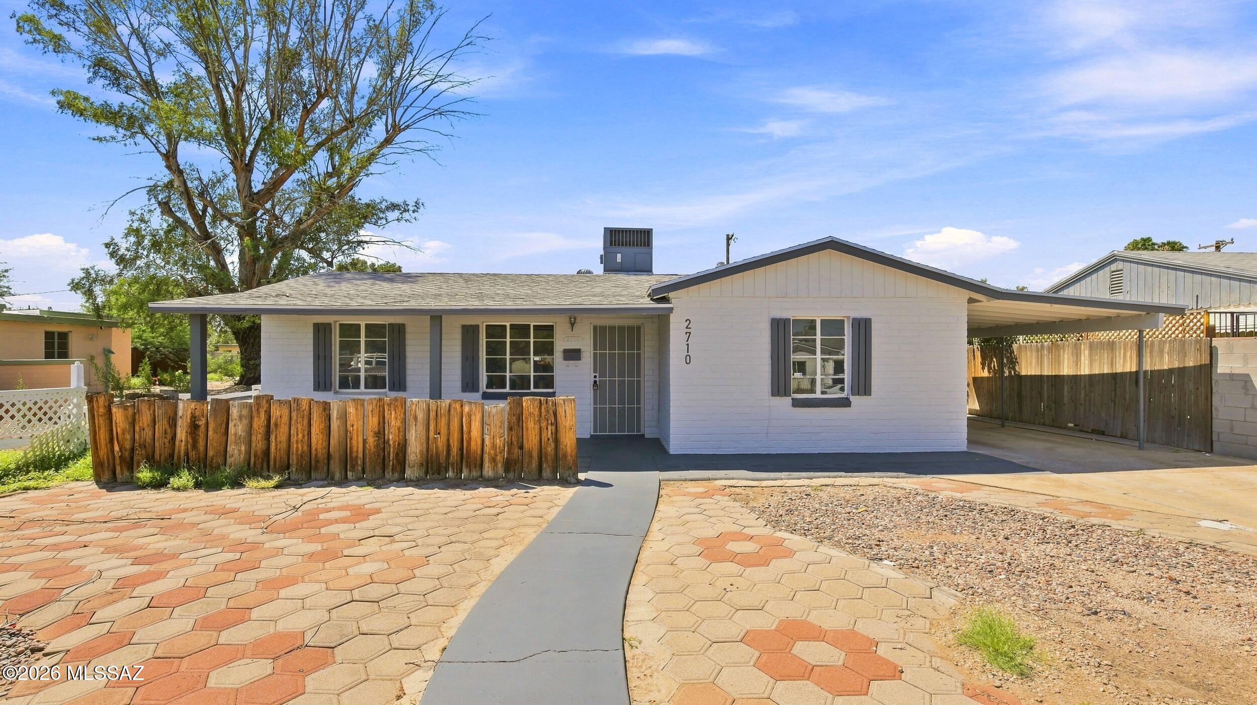 Super cute 2BR/1BA, 1,316 sq ft home in desirable Midtown/Central Tucson. Located minutes from Reid Park, Randolph Golf Course, shopping, and popular restaurants, this home offers convenience and charm in a well-established neighborhood. Features include fresh paint inside and out, new lighting, a recently updated kitchen and newly updated bathroom and all new plumbing plus bright living areas, and a functional layout with newer flooring, newer roof and a den!! A wonderful opportunity to own in one of Tucson's most sought-after central locations.