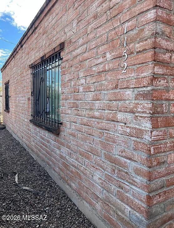 Charming 2 bedroom, 1 bathroom rental located in the heart of Tucson, offering approximately 900 sq. ft. of comfortable living space with classic Tucson character. This inviting home features an updated kitchen and remodeled bathroom, blending modern convenience with unique Southwestern charm. The cozy living room includes a traditional beehive fireplace that adds warmth and an old-school Tucson feel to the space. Enjoy year-round comfort with air conditioning, ceiling fans, and heating. The kitchen comes equipped with a refrigerator, stove, oven, and microwave, while the home also includes a washer and dryer for added convenience. Step outside to a small private fenced yard and patio area, perfect for relaxing outdoors.