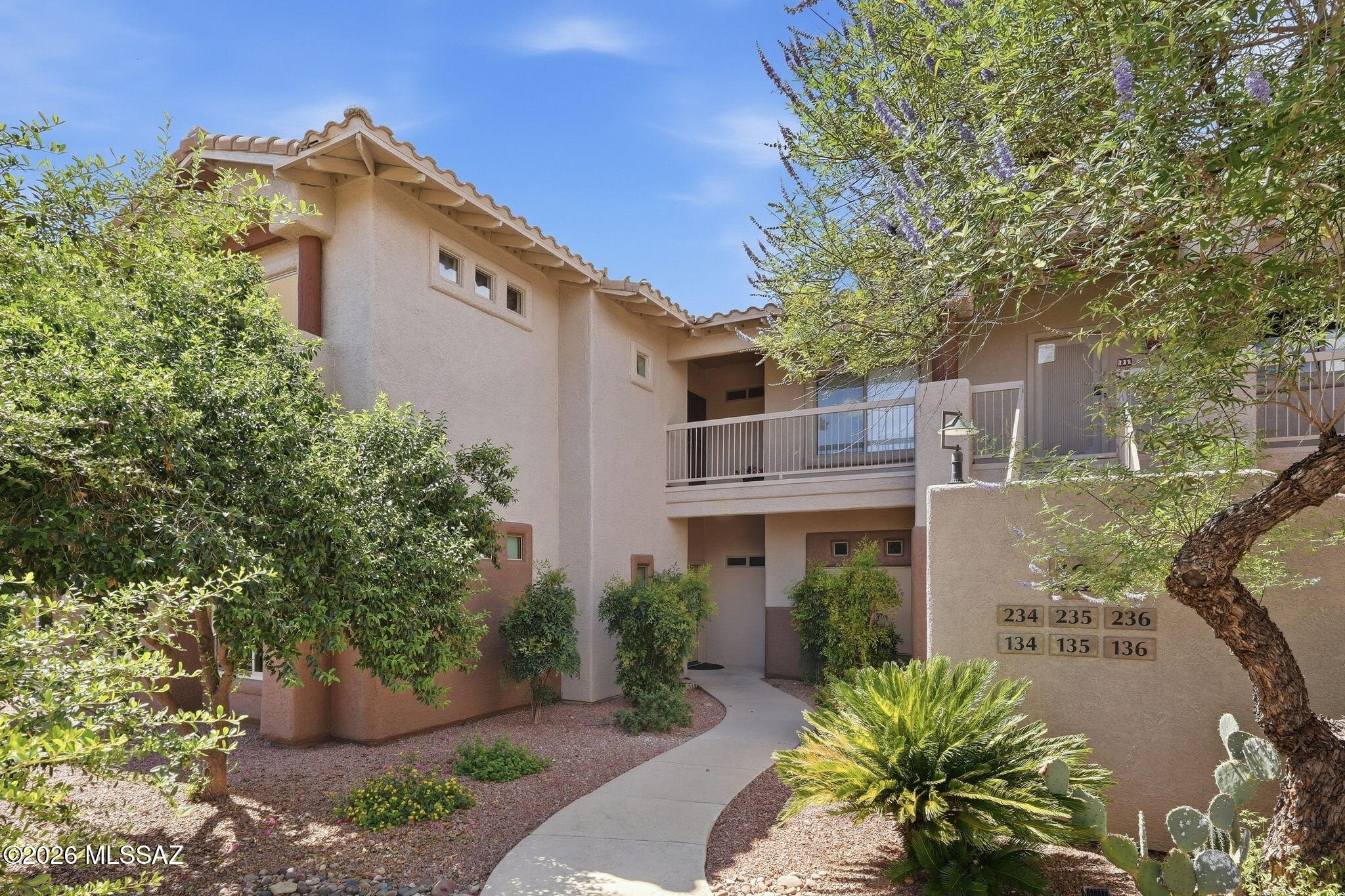 Experience modern elegance in this beautiful, ground-floor Vistoso Resort Casita. Featuring dual Master Suites and sold fully furnished, this turn-key residence offers both comfort and high-end updates, including new Milgard windows (2022), HVAC system (2025) with a 10-year transferrable warranty, and a water heater (2017). The spacious, light-filled layout flows seamlessly from the charming breakfast bar and designated dining area to a custom entertainment center, complete with a practical, dedicated laundry space. Step outside to your private covered patio to take in breathtaking Arizona sunsets, lush desert landscapes, and majestic mountain views. Resort-style living is at your doorstep. Enjoy golf at the nearby Views Golfs Home is being sold fully furnished per owner all furnishings, washer, dryer, recliners, sofa, TV, beds, mattresses, window coverings, shower curtains, and silverware purchased between 2024 and 2026.