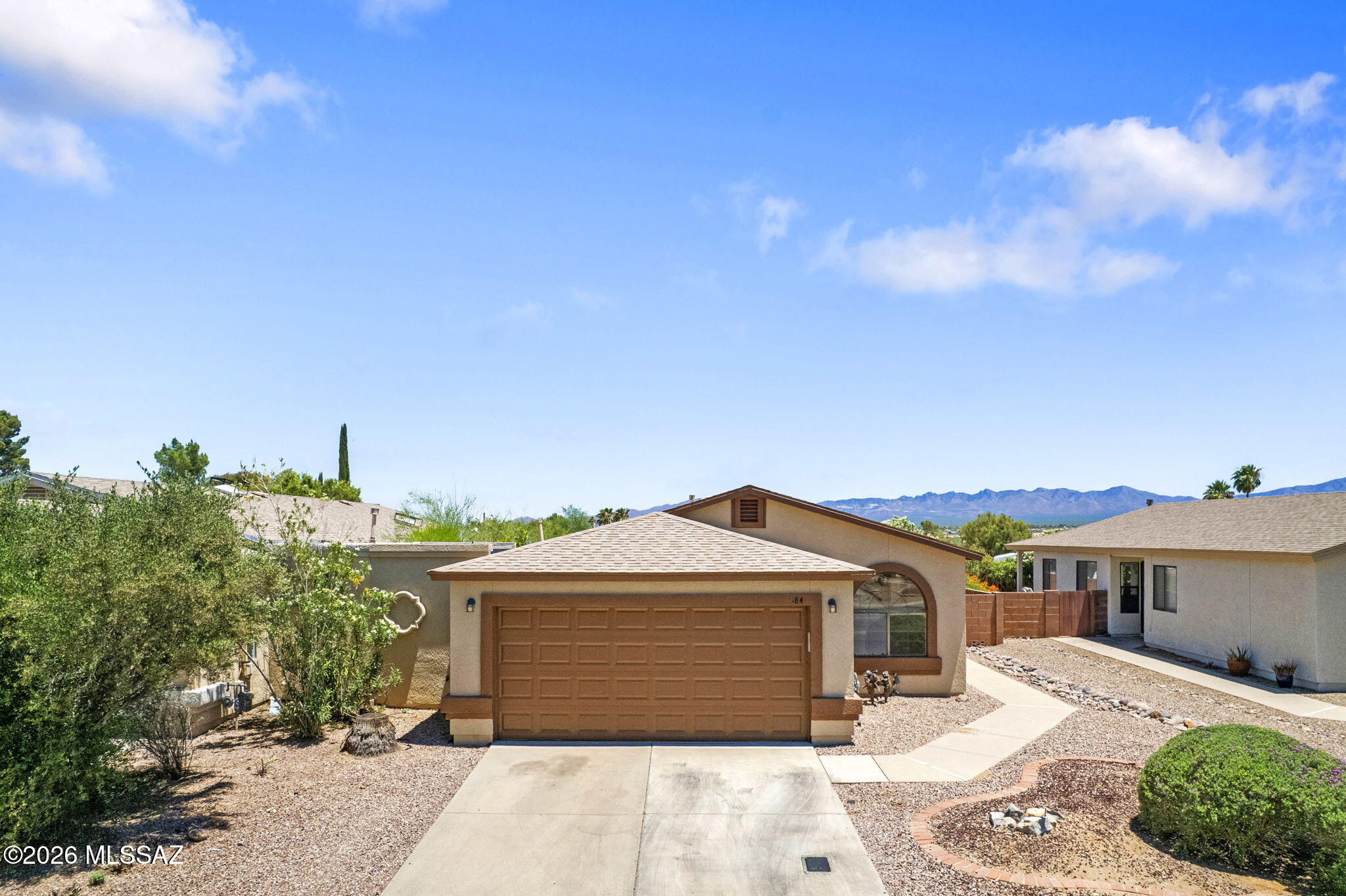 Mountain Views!  Spacious 3 bedroom/2 Bathroom townhome in a family area of Green Valley located in the Continental School District. New Laminate Flooring throughout & ready to move in!! Great starter home or perfect for the retiree with amenities to include Pool, Clubhouse and Basketball Courts. A Must See & Welcome Home!!