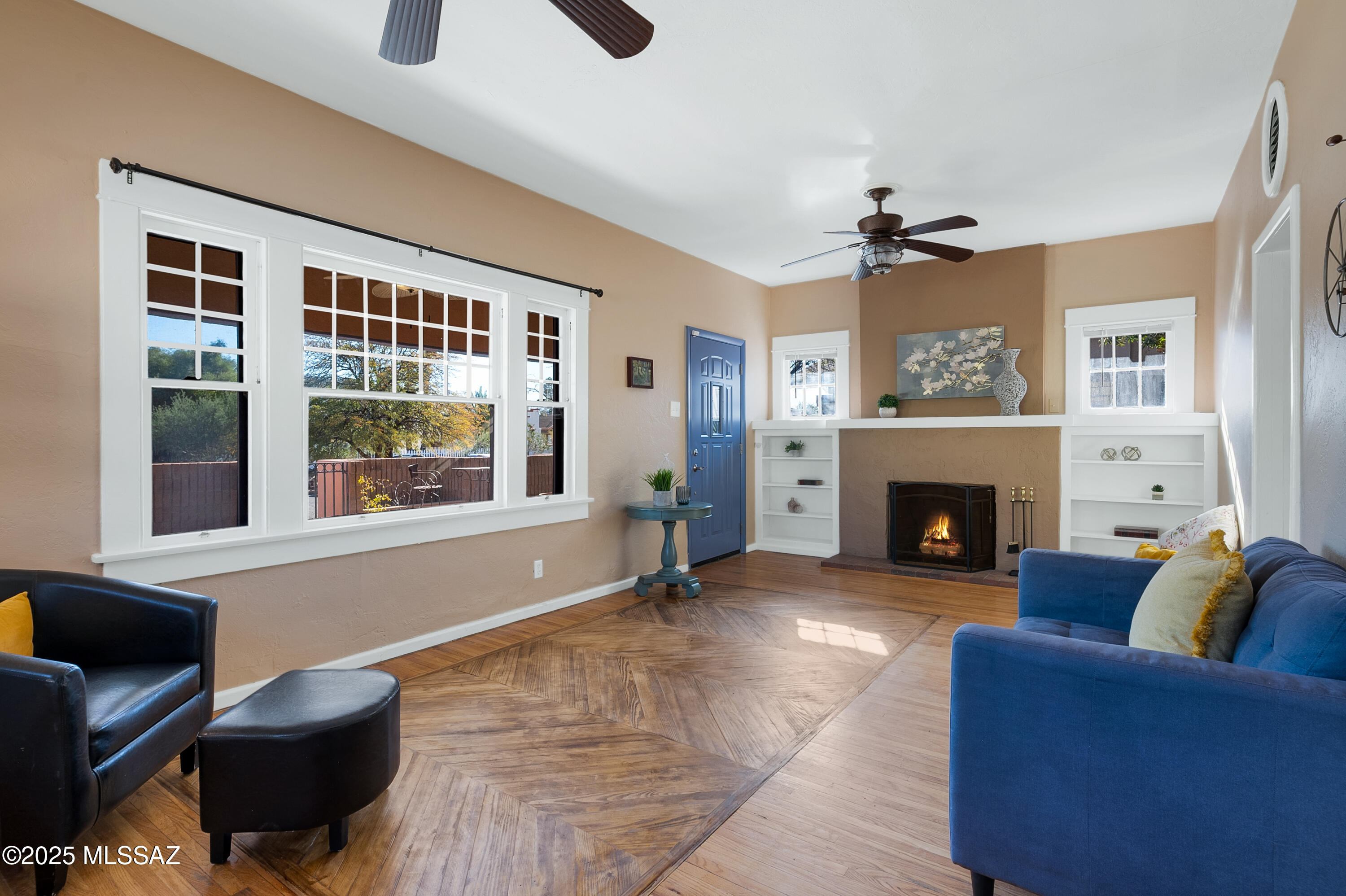 Historic Bungalow in walkable West University neighborhood. With a unique blend of classic downtown architecture and modern conveniences & touches. Enjoy the mountain view from your craftsman front porch or soak up some sun on one of the flagstone patios. Step into the charming living room and appreciate the beautiful built-in bookcases, fireplace and tons of natural light. Kitchen has oversized gas Viking stove & Viking fridge along with updated cabinets and countertops. Large dining room is perfect for hosting those special occasions or weekday dinners! Huge master suite upstairs with multiple closets, new carpet, access to the roof and open bathroom. Downstairs bedroom is oversized as well with high ceilings, concrete floors, and access to the yard.