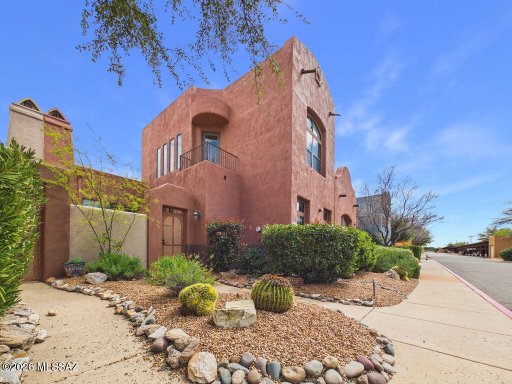 Beautiful townhome located in the heart of Tubac, Arizona. This charming home features two spacious master suites, with one conveniently located upstairs for added privacy. The inviting great room offers a cozy fireplace, while the private courtyard also features its own fireplace, perfect for relaxing or entertaining. Enjoy being within walking distance to Tubac's unique shops, art galleries, and restaurants. The community offers wonderful amenities including a pool, spa, fitness center, refuse collection, exterior paint, and a common area Ramada with a full kitchen. Experience true resort-style living in one of Southern Arizona's most charming and historic communities.