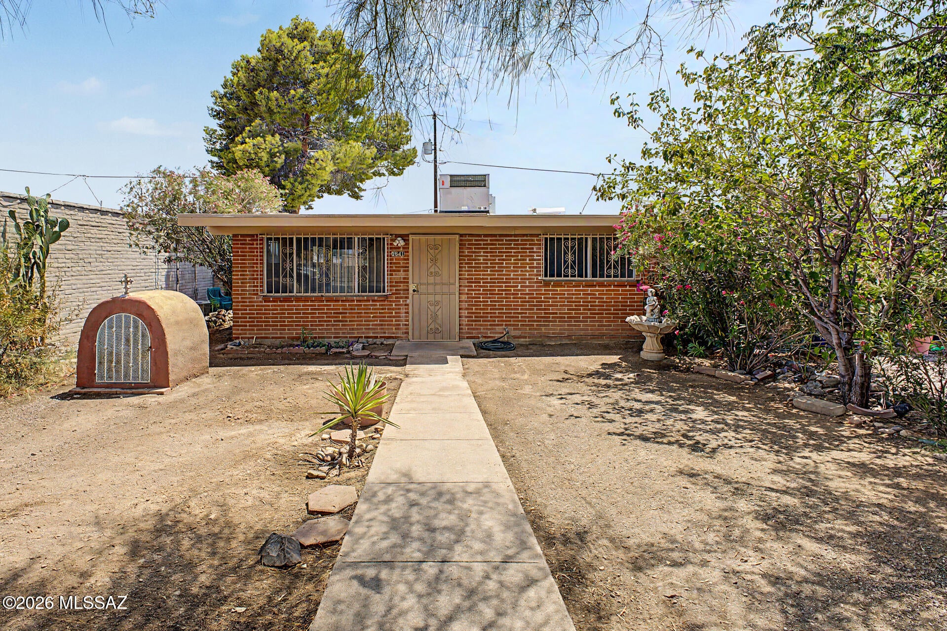Seize the opportunity to own this charming 2-bedroom, 1-bathroom townhome! Inside, you'll be greeted in a bright and spacious living room with tile flooring, plenty of natural light, and neutral paint, creating a welcoming ambiance that makes it perfect for both entertaining guests and unwinding after a long day. The kitchen is ready for your culinary adventures, equipped with flat-panel cabinetry, a peninsula, and built-in appliances for a seamless cooking experience. You'll love the spacious bedrooms with ample closet space for easy organization. The backyard provides plenty of room for outdoor fun, complete with well-laid pavers and an enclosed patio. What are you waiting for? AS-IS Don't miss out on this one!