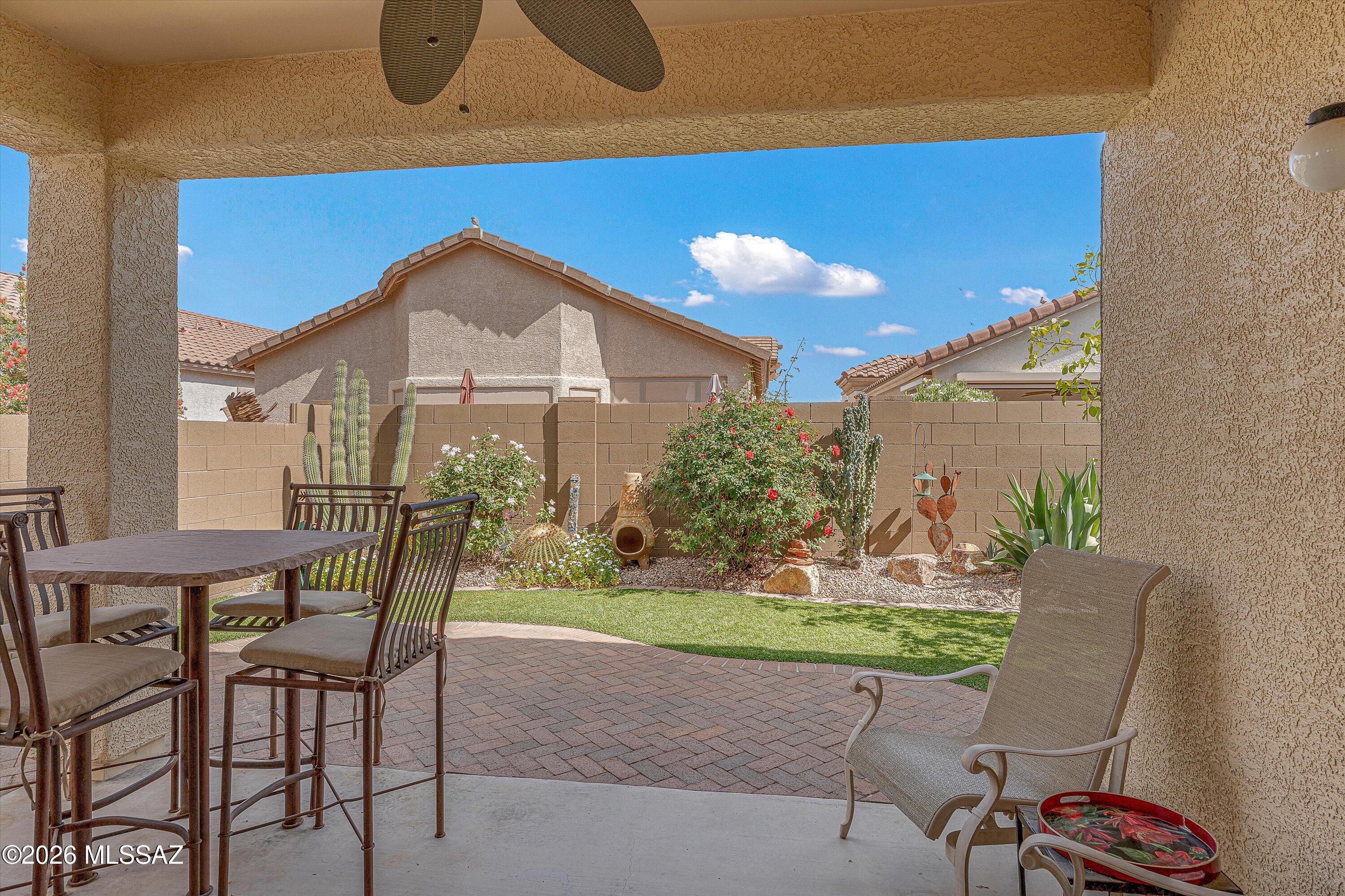 Enjoy all that 55+ living has to offer in this charming turn-key, single-owner home located in Sonora by Del Webb. The backyard oasis offers a covered patio with pavers and turf, raised back wall for added privacy, and grapefruit, lemon, and orange trees. Enjoy the greenery of the backyard from the NEW windows in your primary suite, where you'll also find a walk-in closet and stand-up shower for convenience. You will love the dark sandstone countertops in the kitchen, whole-house water filter, tile throughout, sliding panel shades in the living room, and epoxy floors in the garage. Available furnished and equipped! With a home in excellent condition like this one, you will have more time to enjoy the exclusive Sonora Clubhouse-- meeting neighbors, making friends, playing pickleball, swimming in the heated pool, and so much more.