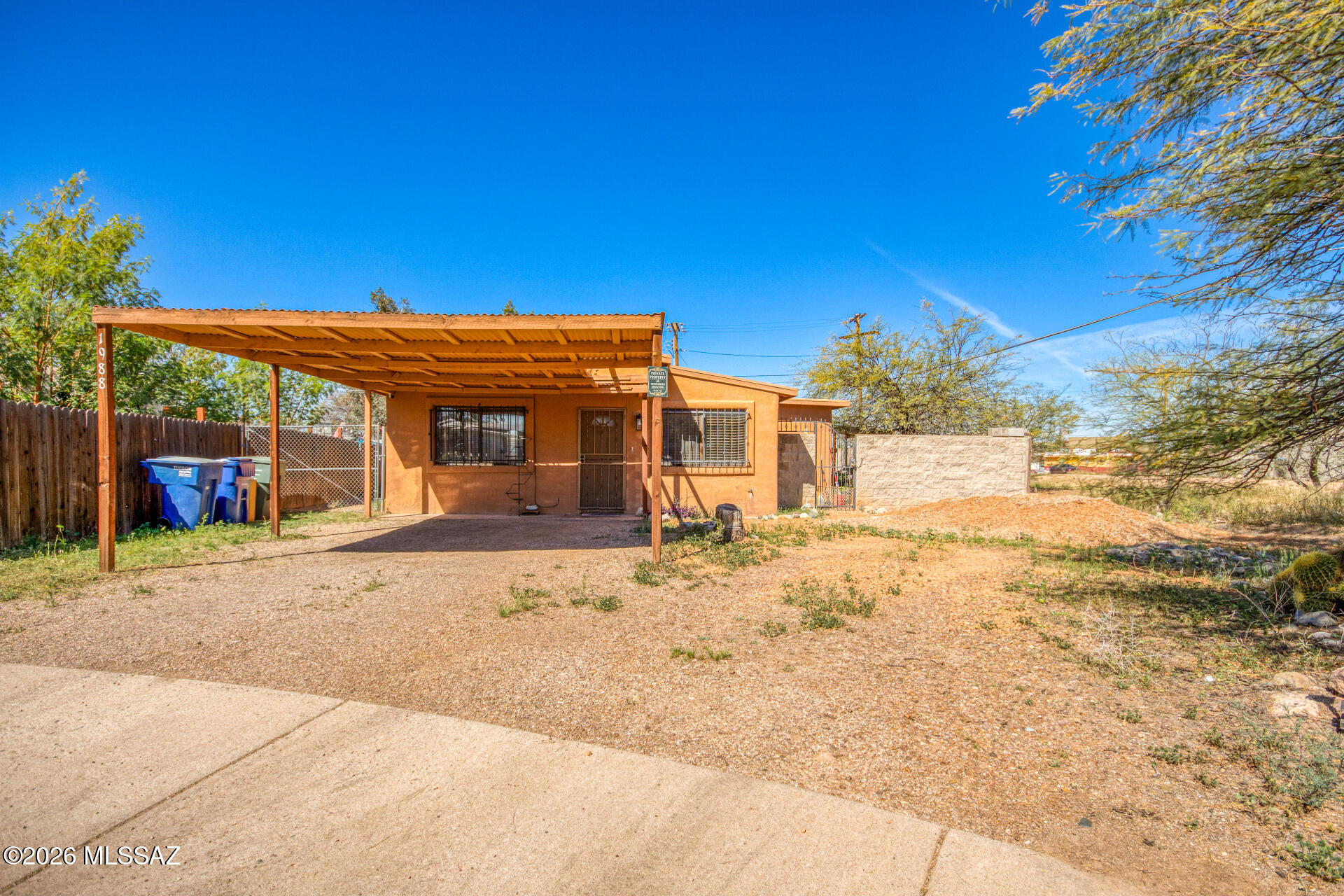 Welcome to 1988 S Longfellow Place, a charming Adobe-style home located in the heart of Central Tucson. This inviting property features 3 bedrooms, 2 bathrooms, and offers a spacious living experience with its large cul-de-sac lot. 

Step inside to discover an updated interior that combines comfort with Southwest character. The home boasts an open layout, perfect for both relaxing and entertaining. The kitchen and bathrooms have been thoughtfully updated, providing modern amenities while maintaining the home's classic appeal.

The expansive backyard is a true highlight, offering ample space for outdoor activities, gardening, or future expansion.