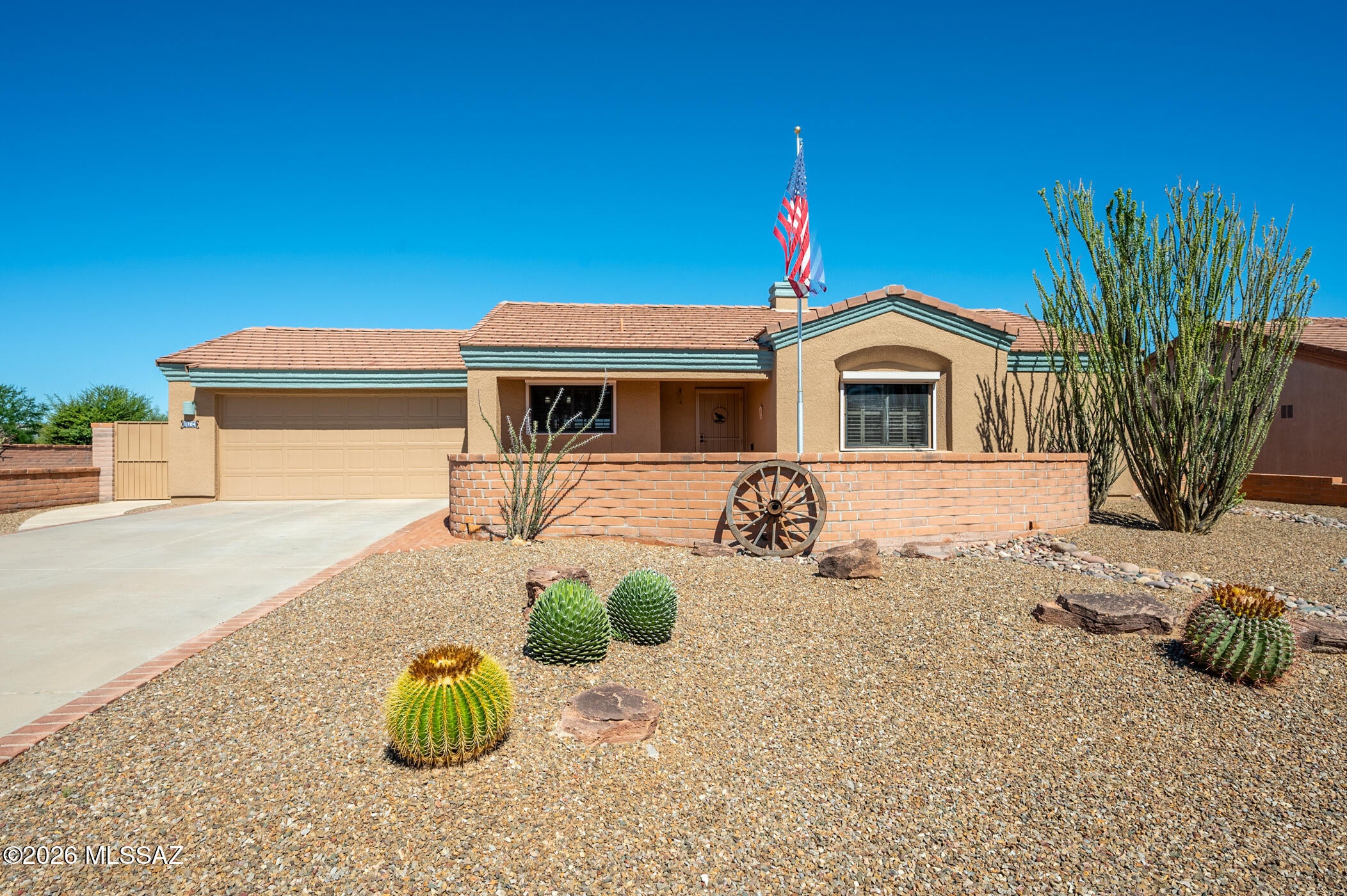 Refined desert living meets exceptional pride of ownership at 1704 W Vista Ridge Dr, a meticulously maintained, one-owner home in the sought-after San Ignacio Vistas neighborhood of Green Valley. Thoughtfully cared for and updated throughout the years, this 2-bedroom, 2-bath residence offers 1,129 sq. ft. of beautifully appointed living space on a private .25-acre lot.
Step inside and you're welcomed by a bright, open living area that flows seamlessly into the dining space and kitchen, creating an inviting layout ideal for both everyday living and entertaining. Ceramic tile runs throughout the entire home, while plantation shutters throughout add a timeless, polished touch and provide excellent control of natural light and privacy. The kitchen is beautifully finished with quartz countertops, while both bathrooms continue the elevated look with quartz surfaces and updated tile-surround showers.
The true highlight is the home's connection to the surrounding desert landscape. A screened-in patio creates an inviting outdoor retreat overlooking the natural arroyo, with the golf course and mountains providing a picturesque backdrop in the distance. Whether enjoying your morning coffee, entertaining friends, or unwinding at the end of the day, this peaceful setting captures the essence of Southern Arizona living.
The private quarter-acre lot offers added breathing room and tranquility, while the 2-car garage with built-in storage provides excellent functionality. Important improvements include PEX plumbing completed in 2015, a roof tile reset in 2016, and a water heater replaced in 2026, adding valuable peace of mind.
As a Green Valley Recreation member property, you'll also enjoy access to GVR's extensive recreation centers, pools, fitness facilities, clubs, activities, and social opportunities throughout Green Valley.
Immaculate, thoughtfully updated, and surrounded by quintessential Southern Arizona scenery, 1704 W Vista Ridge Dr is ready for its next chapter. Simply bring your belongings, settle in, and start enjoying the Green Valley lifestyle.