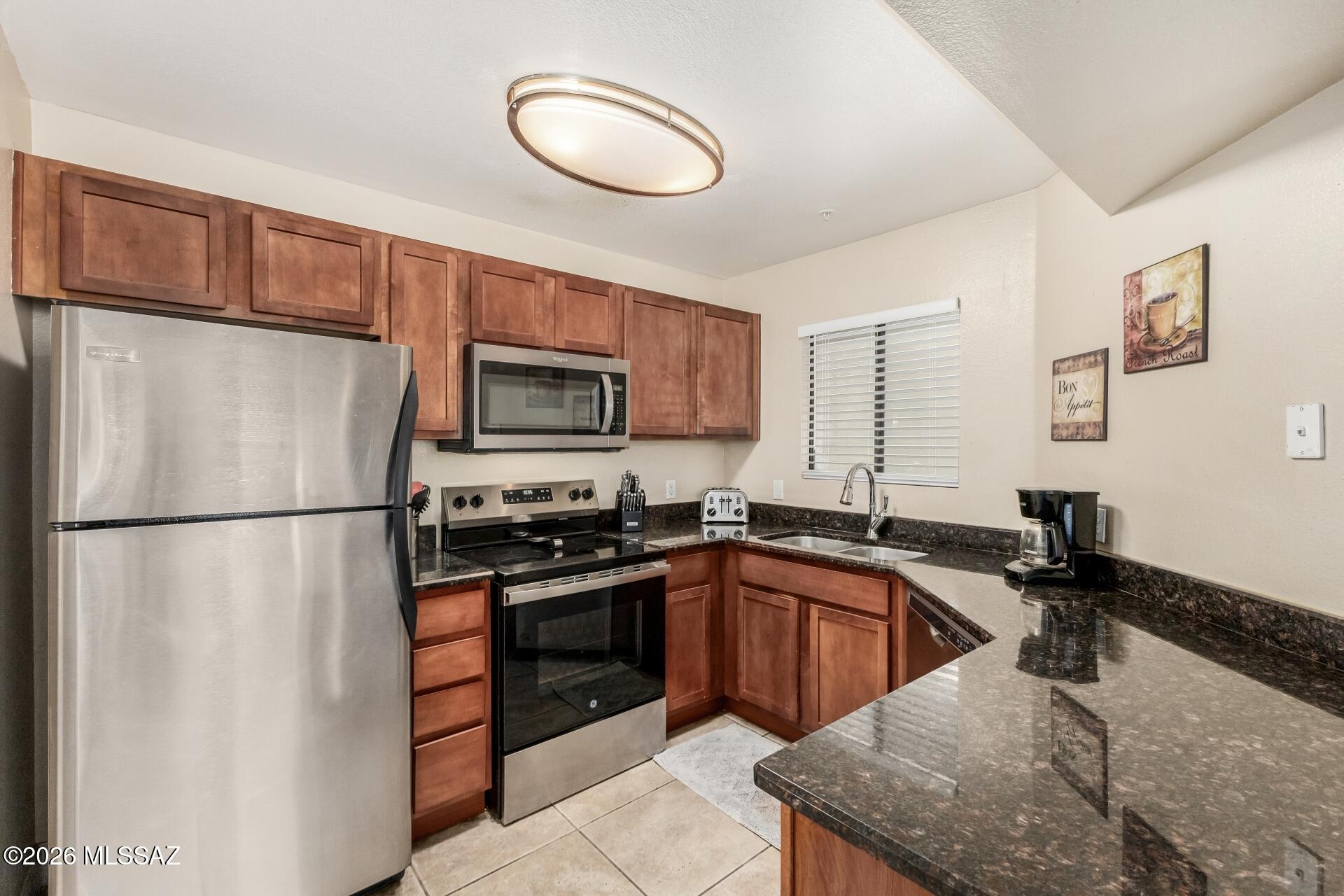 Experience refined, low-maintenance living in this beautifully situated 3 bedroom, 2 bath ground floor condo with mountain views in the desirable Veranda At Ventana. The inviting interior features granite countertops, a. spacious and versatile floor plan and the ease of first floor living with no steps. Enjoy resort style amenities including a sparkling pool and fitness facility along with beautifully maintained surroundings. Ideally located near premier shopping, fine dining, golf and outdoor recreation. This residence offers the perfect blend of comfort, convenience and Tucson lifestyle. Whether you're seeking a sophisticated primary residence, luxurious second home or attractive investment opportunity, this exceptional condo delivers an effortless lock and leave lifestyle.