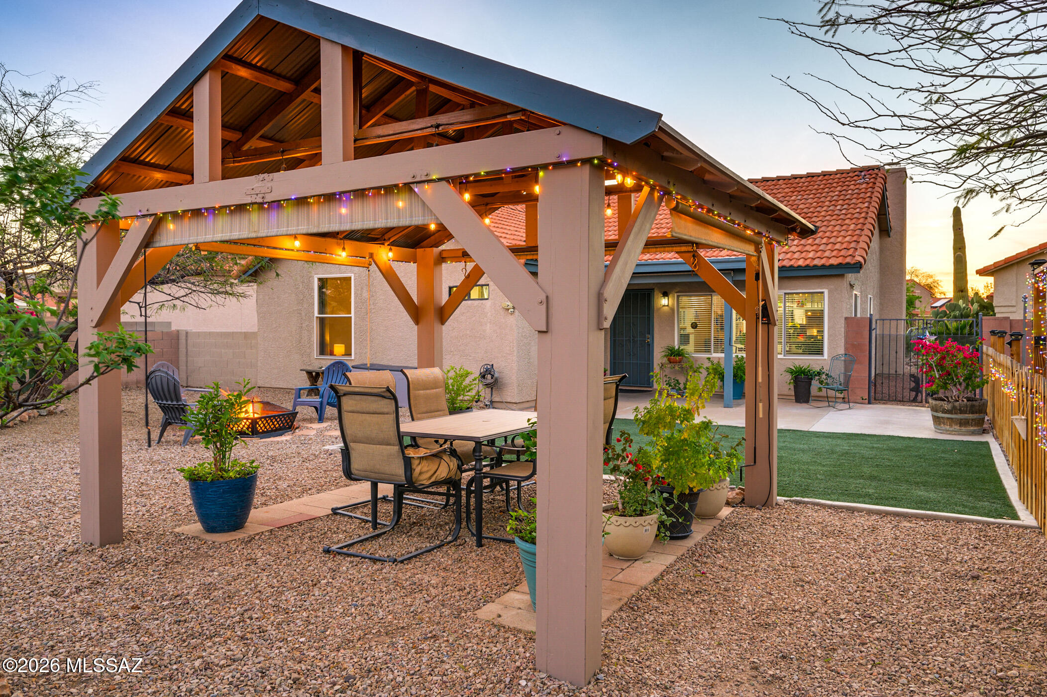 Range pricing: Seller to counter or accept offers between $324,900 and $349,900! Welcome to 8846 N Willeta Drive, a thoughtfully updated and move-in ready home tucked onto a huge cul-de-sac lot where comfortable living and a peaceful backyard setting come together beautifully. Inside, vaulted ceilings, skylights, and abundant natural light create a bright and open feel from the moment you walk in. With no carpet throughout, the home offers a clean, cohesive design that is both stylish and easy to maintain. The inviting living room is anchored by a cozy wood-burning fireplace, creating the perfect space to relax at the end of the day. The kitchen has been thoughtfully opened up by replacing upper cabinetry with shelving, creating a brighter and more connected space for cooking and gathering Stainless steel appliances, including a 5-burner gas range and new Whirlpool dishwasher, provide both function and convenience. Just beyond the kitchen, the dining area features an expanded picture window--larger than the original design--that beautifully frames views of the backyard, so you can still enjoy the scenery while preparing meals or entertaining guests. The home offers three bedrooms and two bathrooms, including a spacious primary suite with a walk-in closet, dual executive-height vanities, and a custom walk-in shower with dual shower heads. Major updates add valuable peace of mind, including HVAC installed in 2019, upgraded copper water lines, and new windows backed by a transferable lifetime warranty. Additional touches like ceiling fans, security doors at both the front and back entries, and durable tile and laminate flooring throughout make everyday living comfortable and practical. Step outside and you'll discover a spacious backyard designed for both relaxation and entertaining. A charming pergola strung with lights creates the perfect atmosphere for evening gatherings, while mature trees provide shade and tranquility. Seasonal color comes from three trees that turn beautifully in the fall, along with a stunning Vitex tree that bursts into vibrant purple blooms. The yard also features fruit trees, synthetic turf, decorative rock landscaping, a large storage shed, decorative side gate, a high privacy block fence, and a dedicated garden area with built-in drip irrigation for growing vegetables, herbs, or flowers year-round. The neighborhood supports an active lifestyle with amenities including golf, a pool and spa, recreation center, basketball and tennis courts, jogging and bike paths, sidewalks, paved streets, and scenic walking trails, all while being just minutes from shopping, dining, and everyday conveniences. Thoughtfully updated and beautifully cared for, this home offers the perfect balance of natural light, comfort, and outdoor living--with a backyard space and cul-de-sac setting that rarely come along. Come take a look before someone else calls it home.