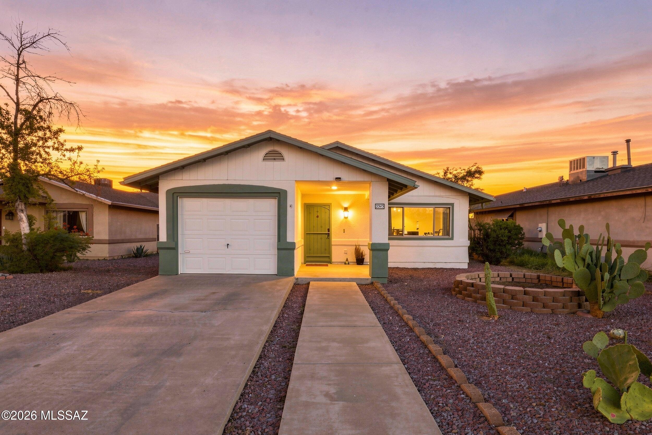 Welcome to this move-in-ready Central Tucson home with something you don't find every day. A private backyard pool, extensive updates and convenient access to some of Tucson's most popular destinations. The recently remodeled kitchen features new cabinetry, quartz countertops, a new dishwasher and a vented hood, opening to the dining area for an easy, functional layout. Vaulted ceilings, recessed lighting and abundant natural light add to the open feel of the home.

Major improvements include a newer AC/furnace package, tankless water heater, updated plumbing, newer roof, updated electrical features, luxury vinyl flooring in the bedrooms, interior and exterior paint, a replaced pool pump/motor, and a new garage door being installed. Refrigerator, washer and dryer convey. Step outside to a low-maintenance backyard built for Arizona living, complete with a sparkling pool, shade sails and plenty of space to relax or entertain. Wide rear access provides added versatility for trailer or RV access.

Centrally located near the University of Arizona, Reid Park, Downtown Tucson, shopping, dining, recreation and nearby biking routes. With significant improvements already completed and a pool ready for summer, this home offers an exceptional combination of location, lifestyle and value.