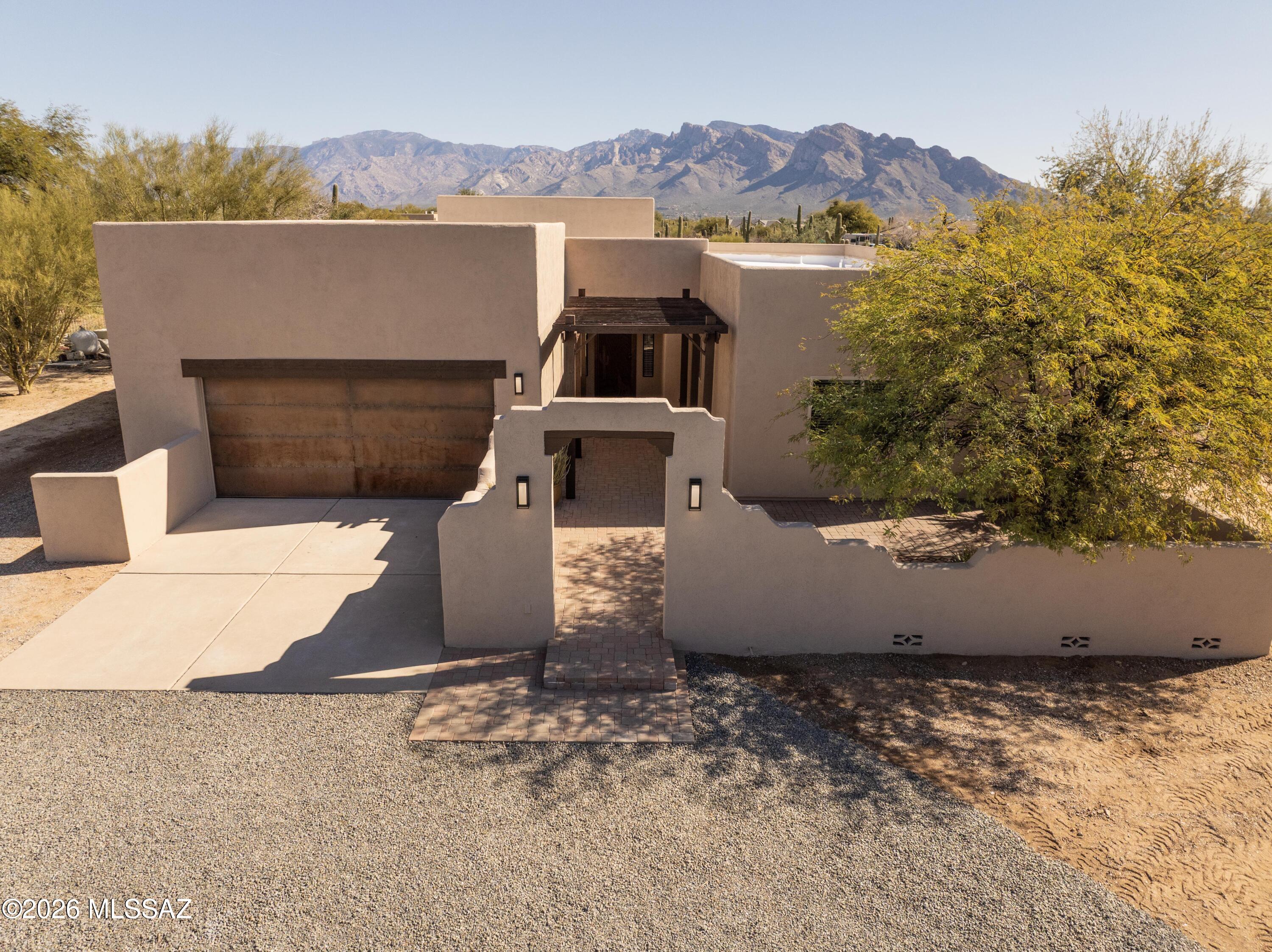 Fully reimagined on nearly an acre in a quiet northwest Tucson enclave, this thoughtfully upgraded property blends modern updates with wide-open desert living. Inside, you'll find a completely refreshed interior featuring brand-new sliding doors that flood the home with natural light while boosting energy efficiency.
The open layout offers comfortable everyday living with clean finishes, fresh paint, and seamless indoor-outdoor flow. Step outside and the value really shows an expansive lot provides privacy, flexibility, and room to grow, whether you envision a pool, guest house, workshop, or simply space to breathe.
Positioned in a desirable pocket near Oro Valley with easy access to shopping, dining, and top schools, this home delivers the rare combination of land, upgrades, and locatio all without HOA restrictions.

If you've been waiting for a move-in ready property with elbow room and long-term upside, this is it.