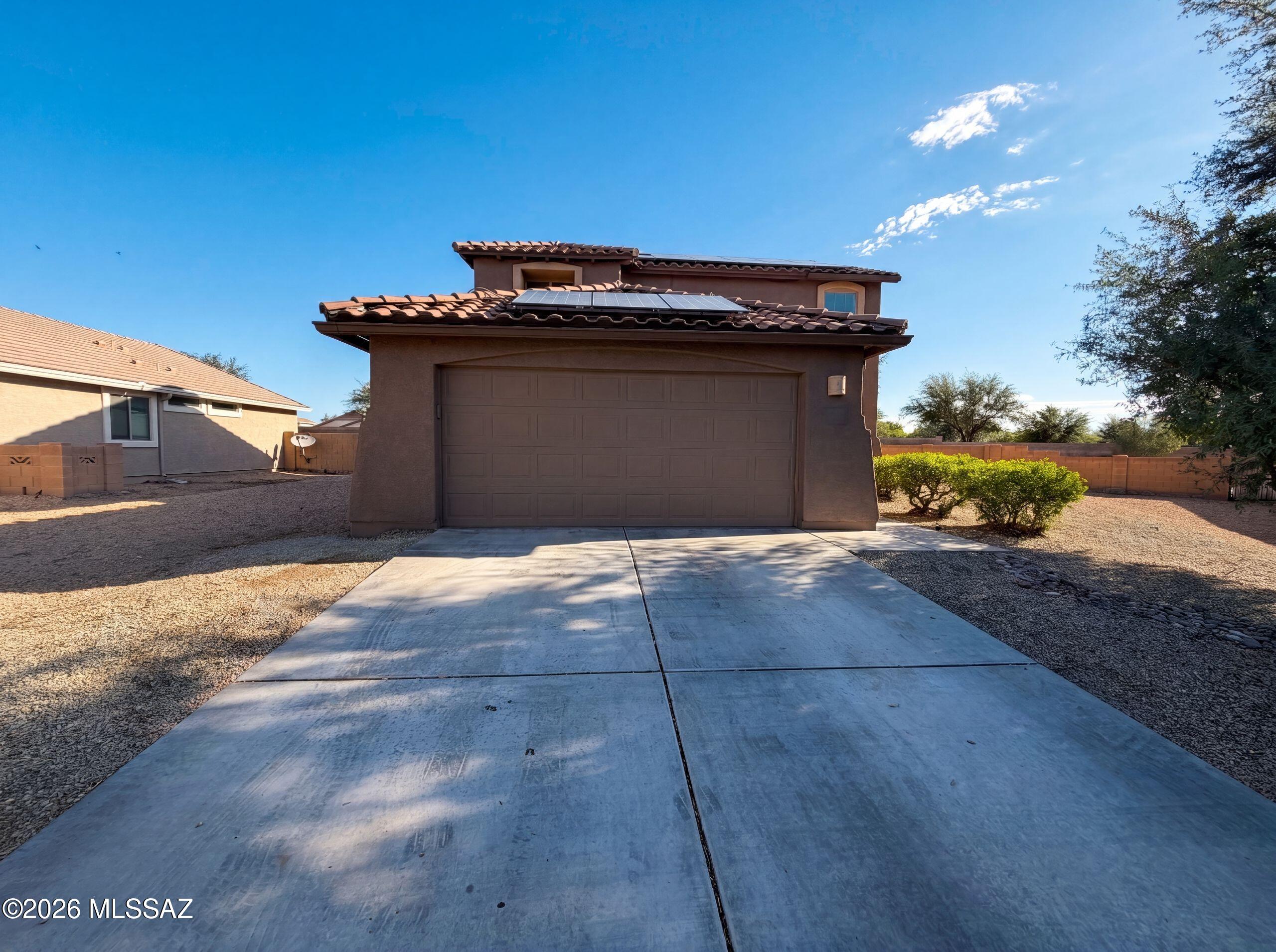 Explore 11244 W Massey Dr, a residence recently enhanced with fresh interior paint throughout. The well-appointed kitchen features an island and all stainless steel appliances, supporting efficient daily routines. The primary bathroom includes double sinks for added convenience. Exterior amenities comprise an in ground pool and a patio in the back yard, providing functional outdoor areas. A must-see for enhanced daily living and refreshing recreation.. Included 100-Day Home Warranty with buyer activation