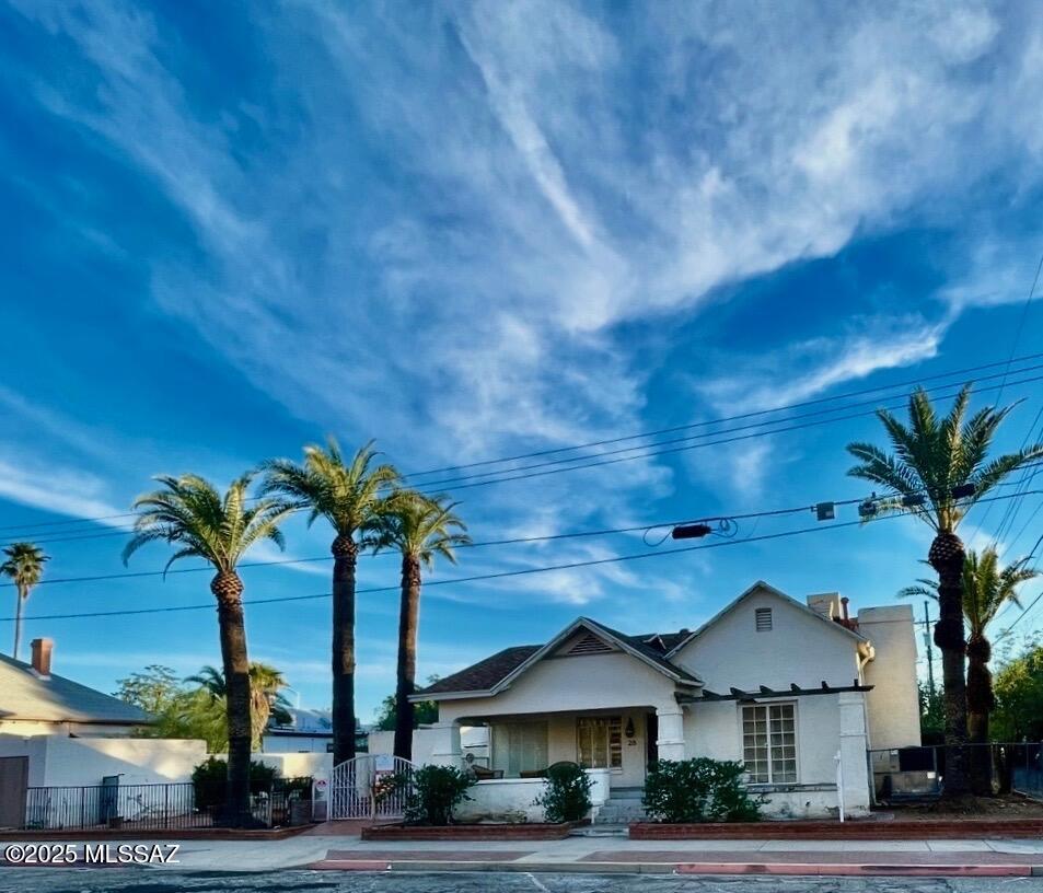One of a kind 1905 Historical Property never before available on the market!! Location is everything and this one has it! It's a corner lot property with street front visibility and a stunning courtyard that is an entertainers dream come true. Access to EVERYTHING that is iconic downtown Tucson. It's 1,895sf, 3-bedroom and architecturally accurate to the time period. Run, don't walk to see this unique property that has unbound limits to what it could become. For the right person with foresight and vision, this is a bucket list property.