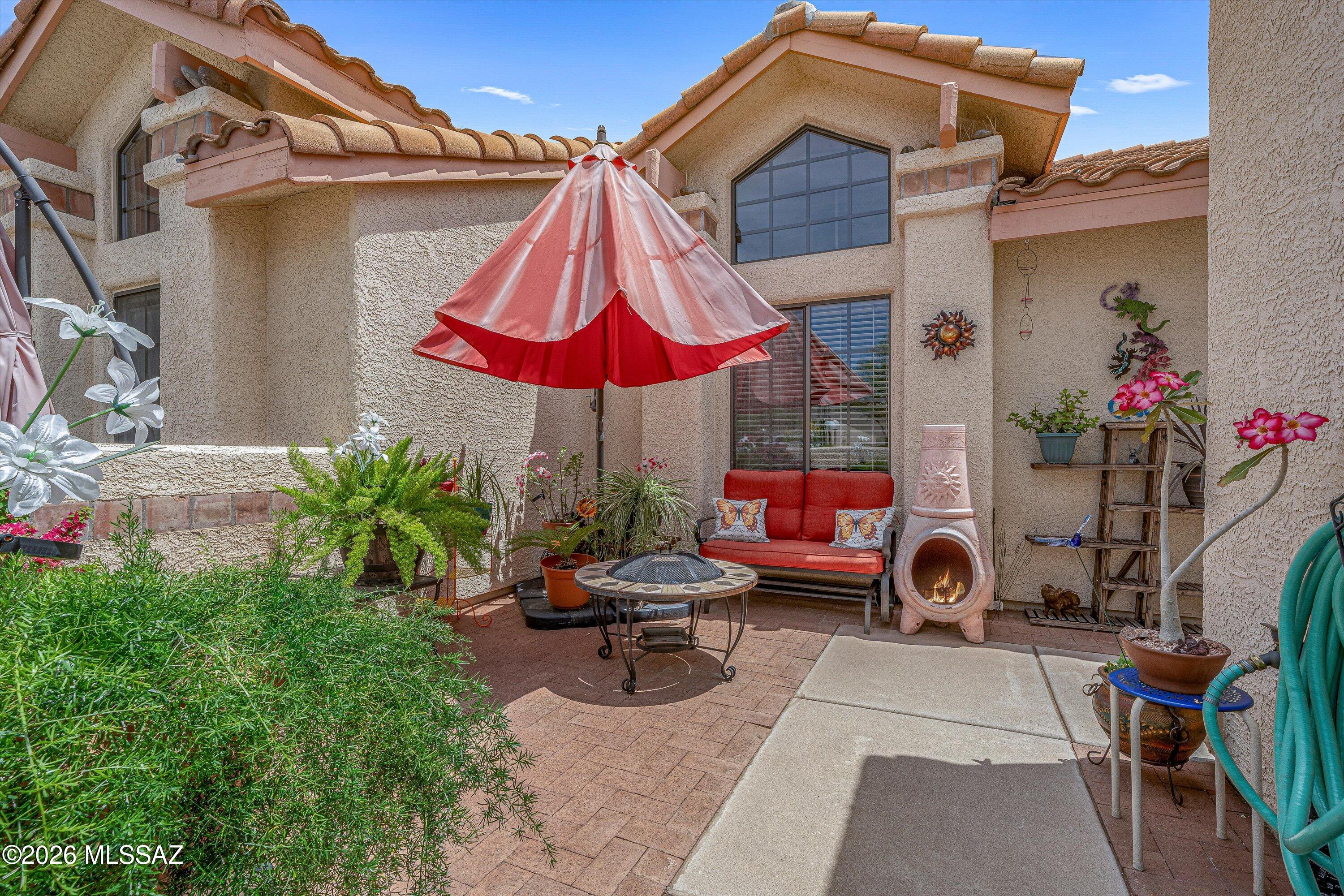 Experience effortless desert living in this beautifully updated, fully furnished 2-bed, 2-bath retreat with breathtaking mountain views.  The light-filled layout features a modern kitchen and baths with solid surface countertops and refined finishes.  Enjoy year round comfort with a brand new heat pump and relax on the spacious screened-in flagstone patio.  This turnkey home includes all furniture and decor with an acceptable offer.