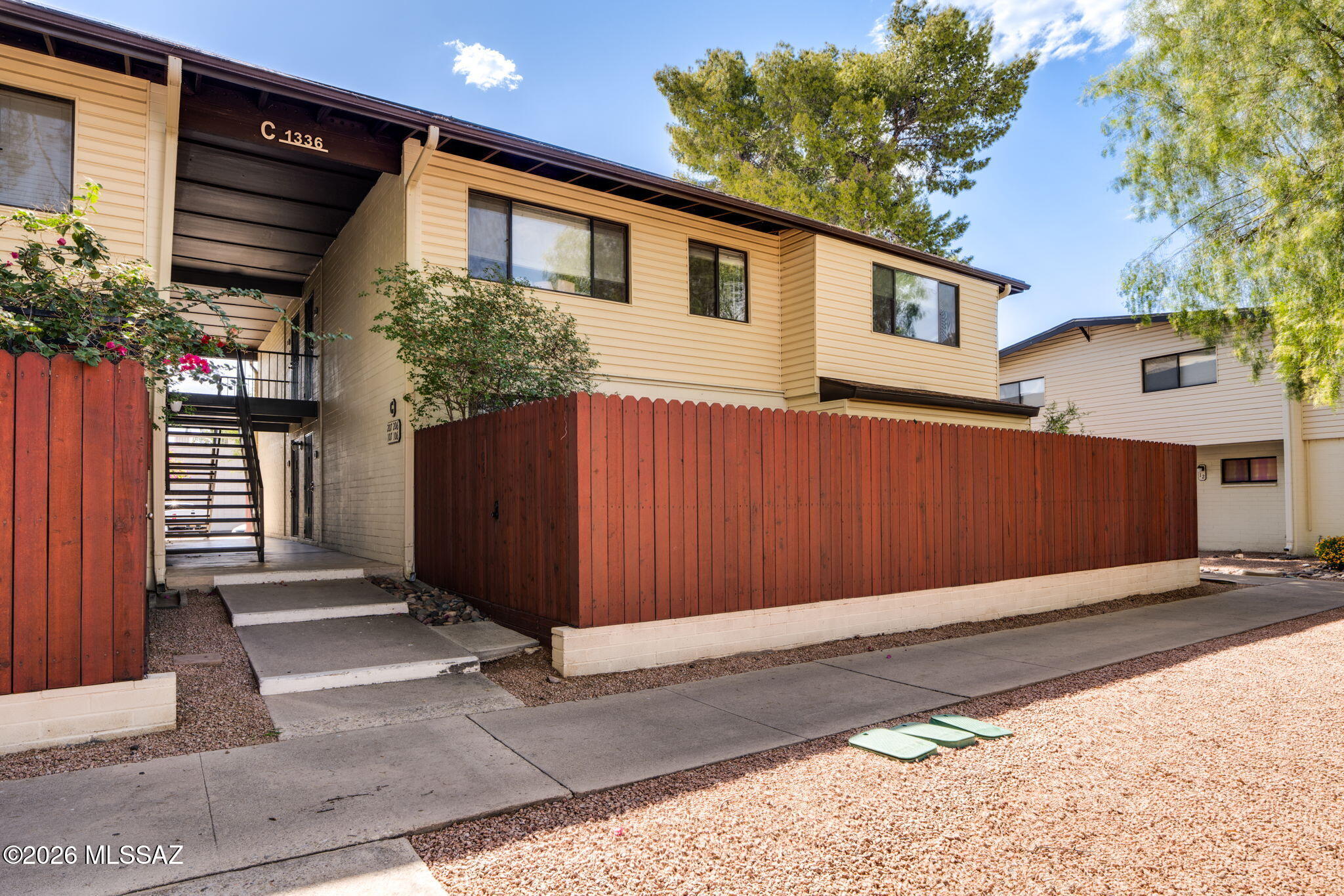 Thoughtfully updated 2 bed, 1 bath ground floor condo offering comfort and convenience!  This move-in ready home features a spacious layout, large private yard perfect for relaxing or entertaining, and easy access to nearby parking.  Located in a well-kept community with fantastic amenities including a sparkling pool and spa, clubhouse, and outdoor play areas.  Whether you're a first-time buyer, downsizing, or looking for an investment opportunity, this charming condo is a must-see!