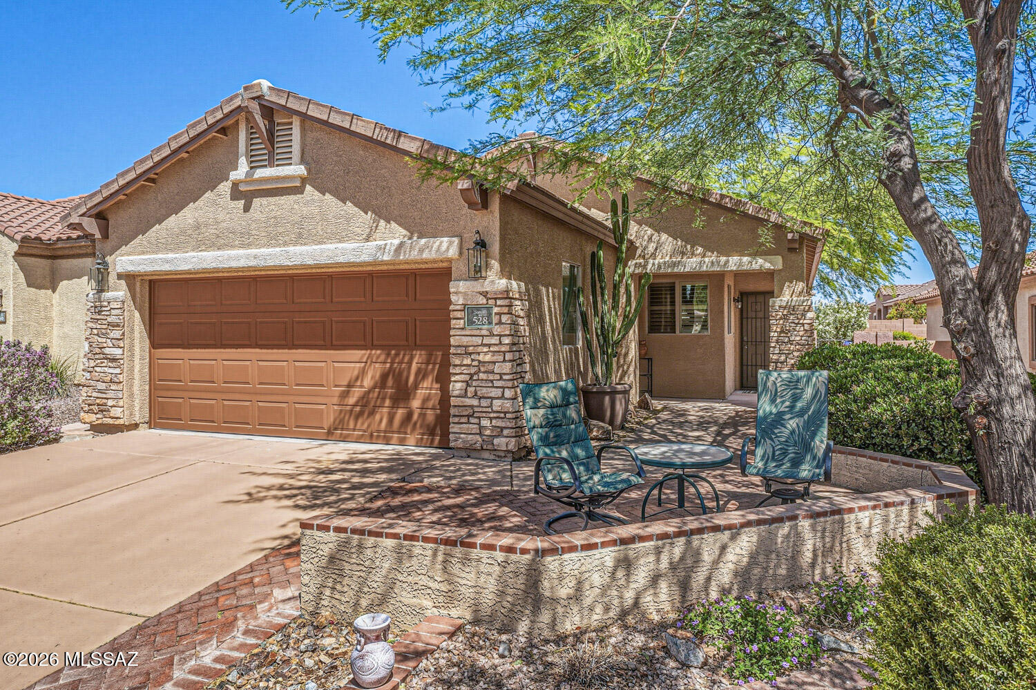 Here's the home you've been waiting for in desirable 55+ active community of Sonora at Rancho Sahuarita by Del Webb. NEW ROOF 2024! NEW HVAC 2022! NO CARPET. This beautiful home with upgrades has an open concept & split bedroom floor plan. Upgraded stainless steel appls, gas range, under counter lighting, white shaker cabinetry & pantry. Primary suite features bay window, dual vanity, walk-in closet & custom barn door. Plantation shutters throughout. Nice backyard with covered patio, extended pavers, custom planter & mature landscaping. Garage has tiled floor, utility sink & side door. Just steps away from the exclusive clubhouse with pool, fitness center, pickleball & tennis courts. Truly move-in ready for you!!! Furnishings are negotiable on a separate bill of sale.