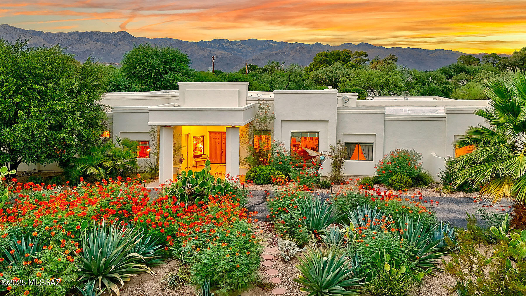 Welcome to timeless elegance and modern comfort in one of Tucson's most prestigious communities, Tucson Country Club. This GRAND 4,672 sq. ft. custom home offers 4 bedrooms, 4.5 bathrooms, and exceptional living spaces that blend architectural sophistication with everyday function. Rebuilt from the ground up in 1997 with commercial-grade construction, this home was thoughtfully designed to meet the highest standards of craftsmanship and convenience. Enhanced with premium upgrades including an X-10 lighting system, whole-house surround sound, abundant storage, and multiple living and working areas, every detail of this property speaks to quality and care. Step into the elegant foyer and be greeted by a formal living room adorned with Cantera stone and gilded custom paint, an inviting space that sets the tone for refined living. The luxurious primary suite is located in its own private wing and is truly a retreat. This space features: an expansive bedroom, spa-like ensuite with dual water closets (including a bidet), separate vanities, walk-in closets, private cedar-lined closet and dedicated laundry room with sink and additional storage.  The flexible bonus space is ideal for a home gym, meditation room, or crafting area. There is also direct access to a full pool bath for easy indoor-outdoor flow. The chef's kitchen is the heart of the home, featuring a built-in paneled GE refrigerator, gas cooktop and prep island, ample cabinetry and cozy office nook. Enjoy hosting family and friends in the adjacent formal dining area, perfect for intimate dinners or holiday gatherings.
The great room is where memories are made. This large, versatile space includes: a built-in wet bar, second fireplace, media area and plenty of space for a pool table, game area, or extra seating.  A nearby closet offers a second laundry hookup, ideal for multigenerational living. Additional living spaces include: two secondary bedrooms connected by a classic jack & jill bath and an inspiring artist studio which can also function as a 4th bedroom or home office.
Step outside to your private oasis and enjoy a pebble tec pool with custom rock slide, built-in BBQ, shaded patio, basketball area for outdoor fun and lush landscaping that adds serenity and privacy.
Enjoy peace of mind with updated mechanical systems and newer pool equipment.
This home has been lovingly maintained and is ready for its next chapter. Come experience the perfect blend of luxury, comfort, and community - all behind the prestigious gates of Tucson Country Club.