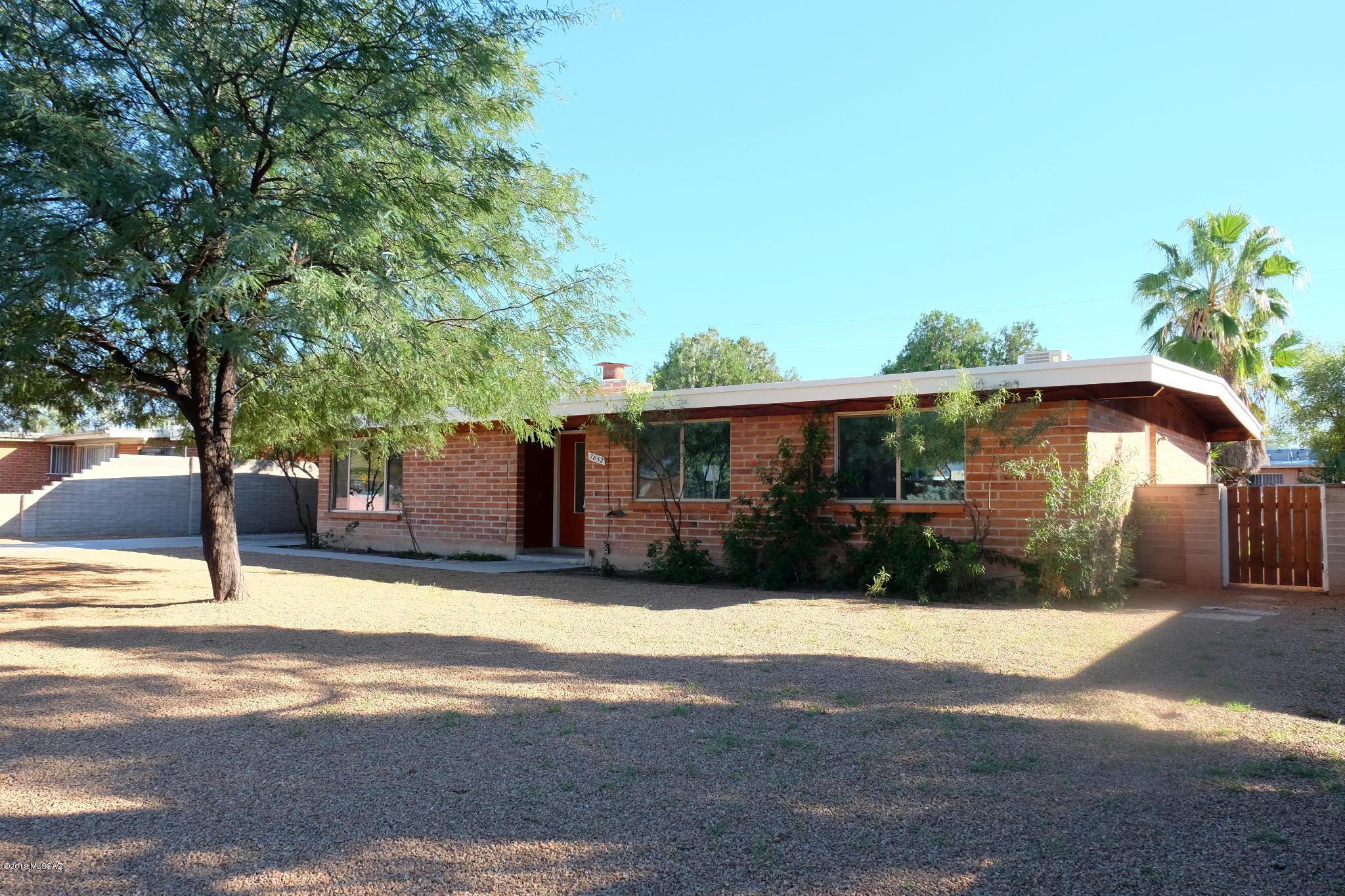 Text for a Walkthrough Video/more info. Remodeled 4 Bedroom/2 Bathroom Silver Shadows Estates home featuring Woodgrain Plank Floors + Ceramic Tile throughout, master BR suite w/ private Bathroom, central air conditioning, open floor plan, attached carport, large walled-in backyard, and located on Tucson's East side close to Tucson Medical Center, Udall Park, The Loop bikeway, and Saguaro Nat'l Park. 1yr minimum Lease, costs incl; non-Refundable $50/adult Application, $1950 Security Deposit, $150/pet Pet with approved pet, $400 cleaning. Tenant pays all Utilities. Owner REQUIRES Tenant's Insurance.