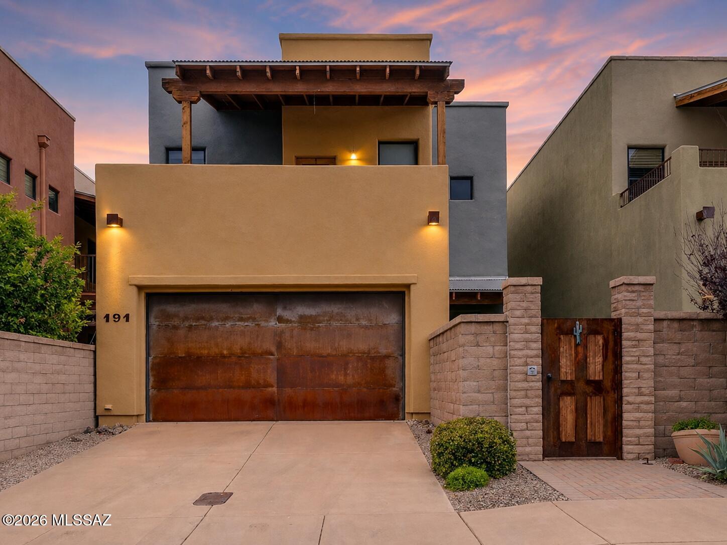 Step into the character and craftsmanship of true barrio-style living. This home blends timeless architectural charm with meaningful, move-in-ready upgrades -- starting with an updated roof, giving you years of peace of mind from day one. The garage adds functional storage and parking, while the patio door draws natural light in and creates an easy connection between indoor living and outdoor Arizona evenings.

Located in Miramonte at the River, enjoy resort-style living with a gated community pool and spa (all the fun, none of the upkeep), sidewalks, a playground and dog park, shaded ramadas and walking paths, plus direct access to the Rillito River Walk and bike trail. This home puts you close to the character of one of Tucson's most storied neighborhoods.