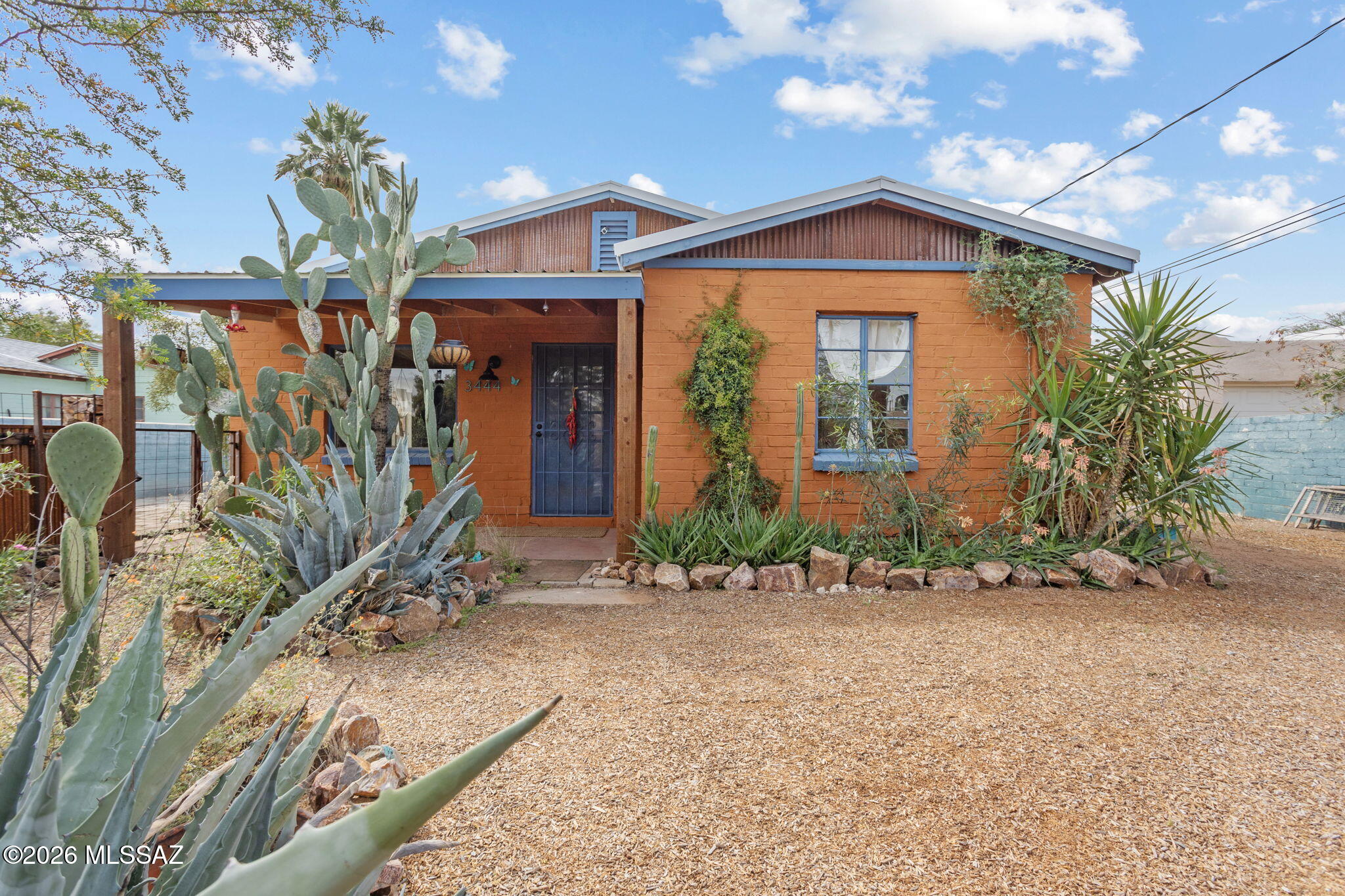Charming midtown bungalow centrally located in Tucson's Palo Verde neighborhood. 3 bedrooms and 1 bath with bonus office/utility room. Whimsical, shady desert landscaping in the front & back yards invite you to explore. Owned solar, efficient HVAC, and newer swamp cooler offer high-efficiency eco-friendly living. Newly-installed metal roof. Well-appointed workshop/studio provides working space for projects and/or storage. Just around the corner from Whole Foods, Coffee Times, and on the planned Miramonte-Palo Verde bike boulevard. Minutes from UofA, Banner University Medical Center, and downtown Tucson.
