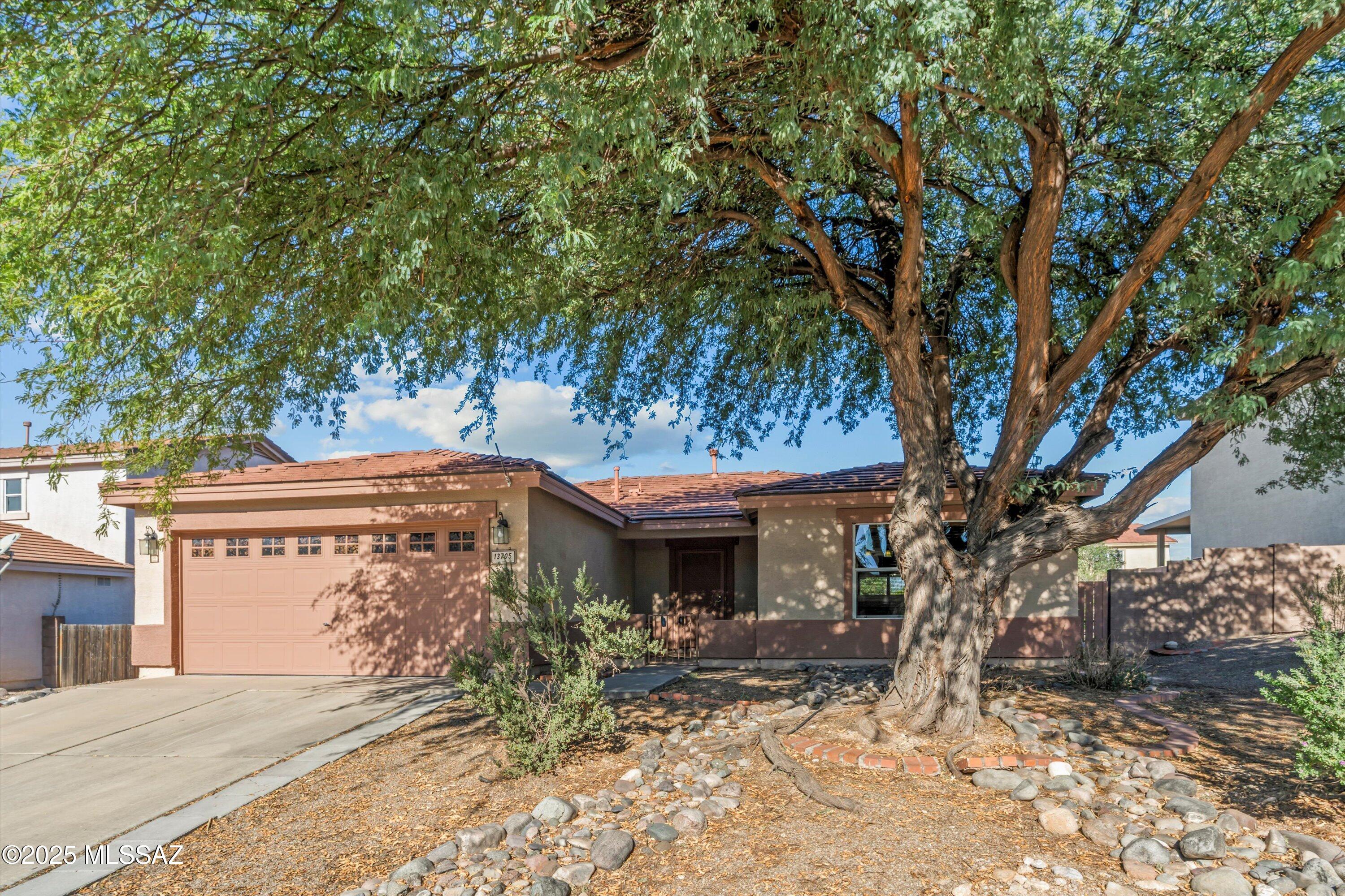 Spacious 3BR+Den / 2BA home in the popular golf course community of Rancho Del Lago.  This charming single story home in the top rated Vail School District features a courtyard entryway, eat-in kitchen with black appliances, open great room concept floor plan, private backyard with covered extended Northwest facing patio and built in gas BBQ, secluded primary bedroom with roomy walk-in closet, garden tub & dual sinks, washer / dryer included, ceiling fans, tiffany style accent lighting, dual pane windows providing tons of natural light and a convenient Southeast location near shopping, restaurants, golf, parks & easy access to I-10. The Rancho Del Lago community features a golf course with practice facilities, side walks & a nearby community park with tennis courts, dog park & playground.
