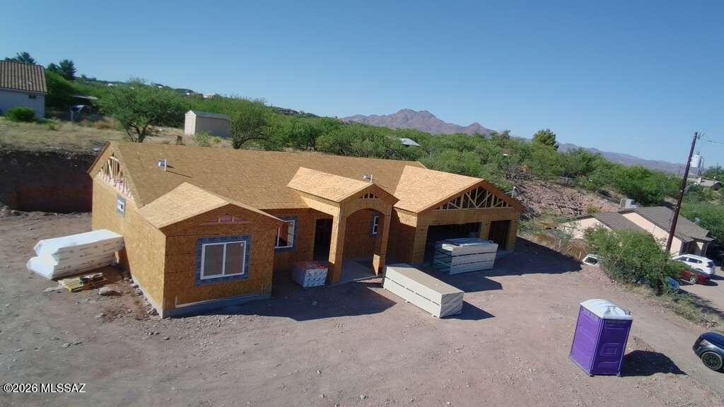 Discover the perfect blend of privacy, space, and breathtaking scenery in this beautiful Rio Rico home. Situated on a premium corner lot of over 0.6 acres, this property offers more than 1,600 square feet of comfortable living space, a spacious 3-car garage, and stunning panoramic views. Located near Rio Rico Dr in a desirable secluded area, you'll enjoy peaceful surroundings while still being conveniently close to town.