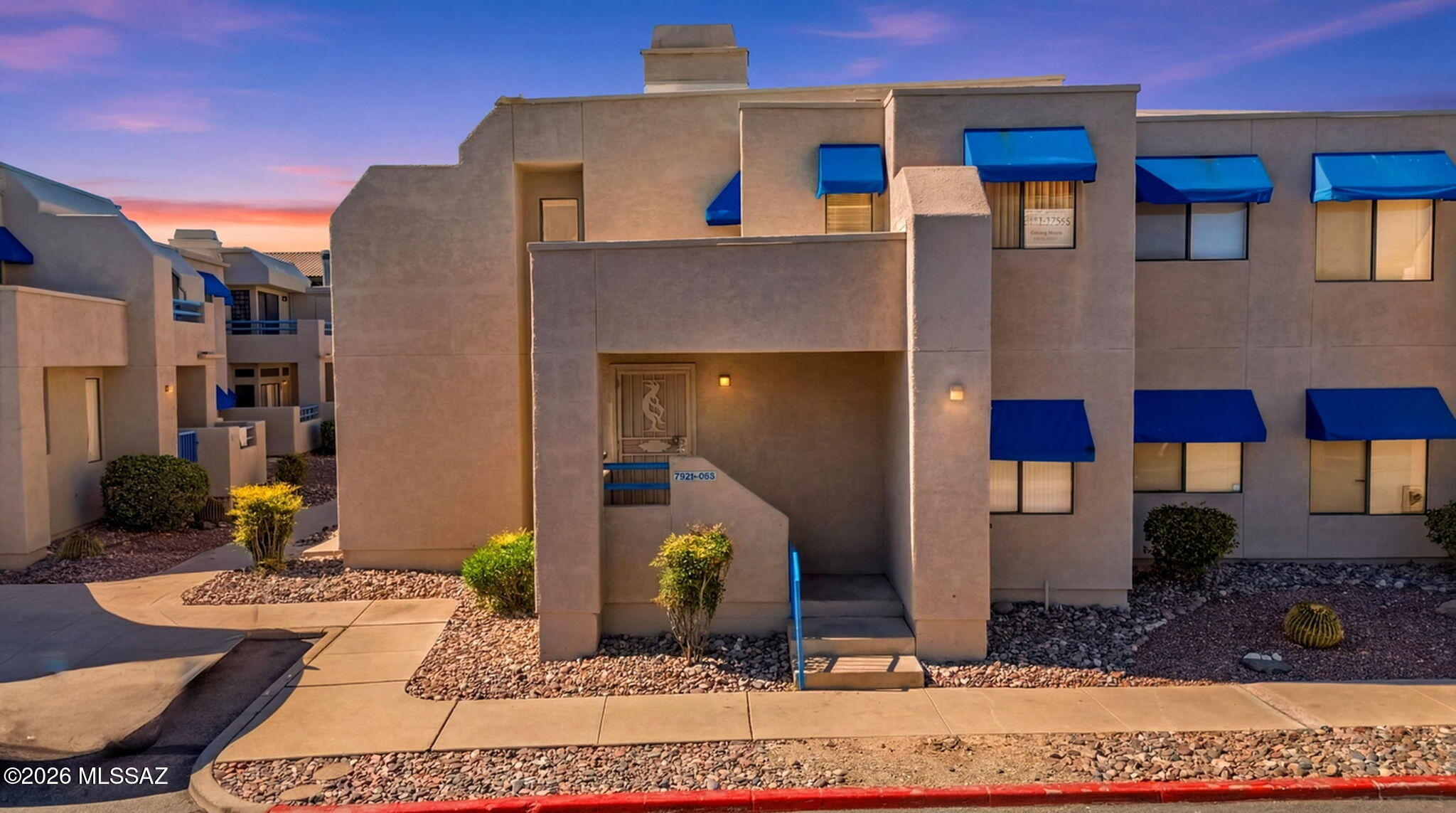 Welcome to this beautifully 2 bedroom, 2 bathroom condo located on Tucson's desirable east side. Fresh interior paint, new bedroom flooring, and no carpet throughout create a clean, modern feel with easy maintenance living. Enter through the private downstairs entry featuring a convenient coat closet before heading upstairs where all living spaces are thoughtfully situated on one level. The open great room flows into the eat-in kitchen and dining area, offering a comfortable layout for both relaxing and entertaining. Enjoy being near the community pool and conveniently located near shopping, dining, and parks. Whether you are looking for a primary residence, winter retreat, or investment opportunity, this move-in ready condo is a fantastic find.