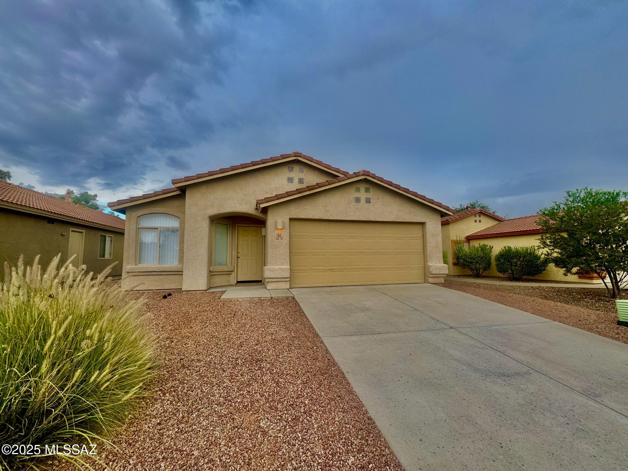 Welcome to this inviting home in the highly desirable Northwest Tucson area, near Oracle and River, just minutes from the Tucson Mall. Tucked away in a quiet, well-kept enclave, this home offers a comfortable and practical layout that's perfect for modern living.
The spacious kitchen features a gas range, large island, and a generous pantry. It opens to the family room, creating an ideal space for everyday living and entertaining. The formal living and dining areas provide plenty of room to gather and host.
The primary suite includes dual sinks, a relaxing garden tub, and a separate shower. 
Conveniently located close to shopping, dining, and outdoor recreation, this home offers both comfort and accessibility.