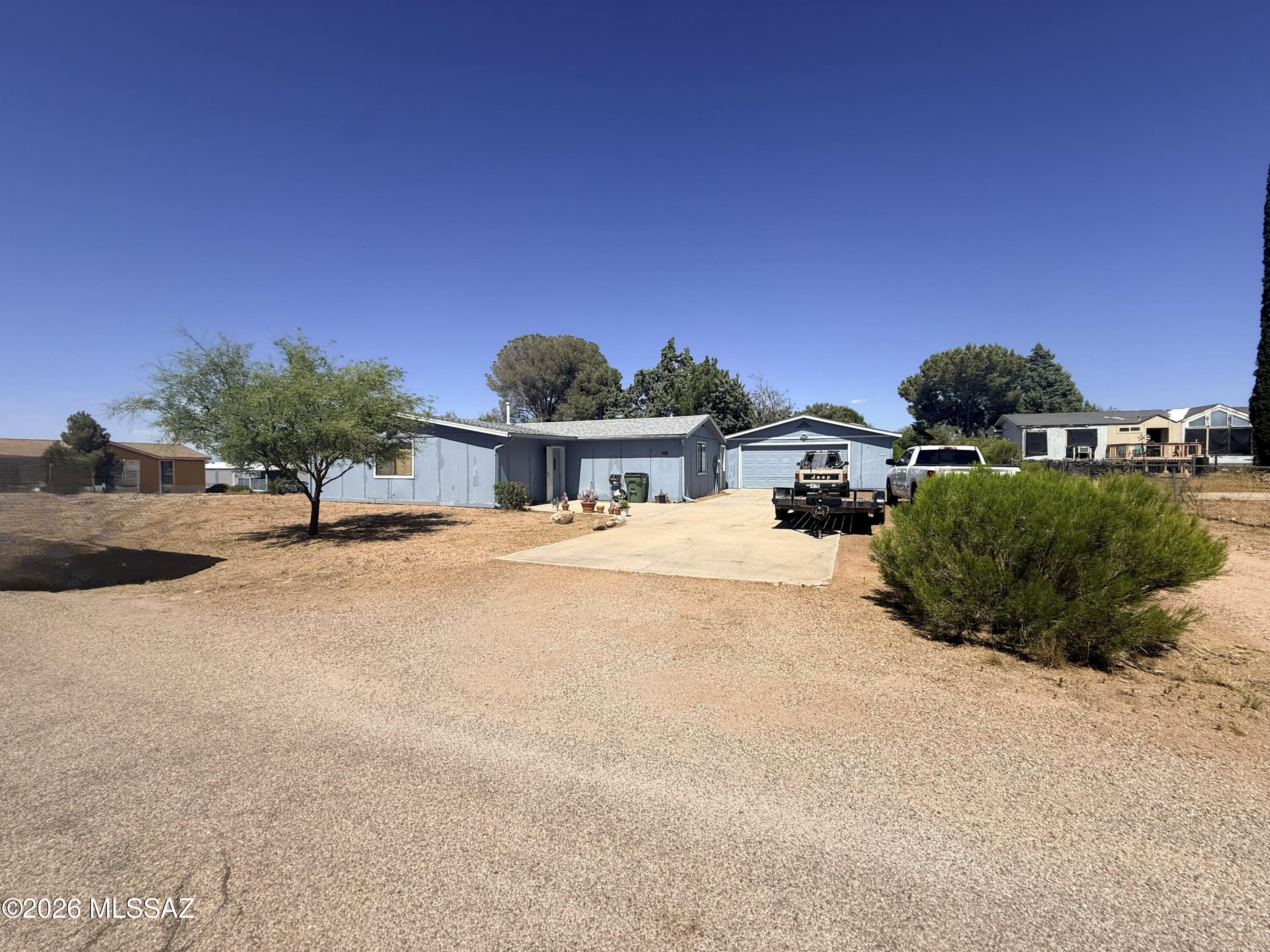 Charming 3-bedroom, 2-bath home featuring a fenced yard and garage. Enjoy comfortable living with ample outdoor space for pets, gardening or entertaining. Conveniently located between Tucson and Sierra Vista with easy access to I-10, shopping, dining, and local amenities. A great opportunity for those seeking small-town living with an easy commute to major employment centers.