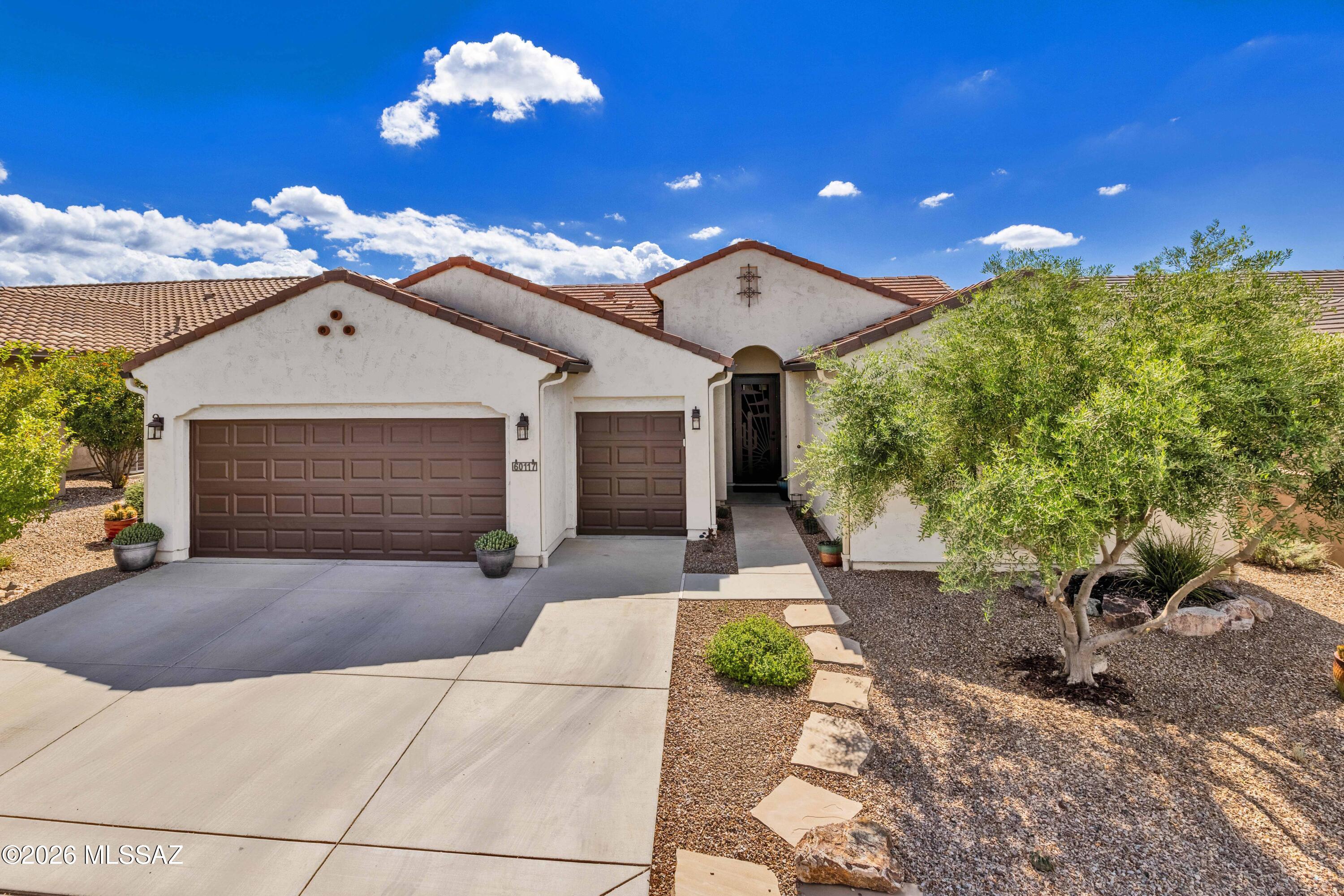 Move-in ready and tucked away on a quiet street in SaddleBrooke Ranch, this one-owner, single-story Hermosa has 2 bedrooms, 2 baths and a den with doors, plus beautiful mountain views from the backyard. Inside are neutral, soothing colors throughout, tile flooring and a fresh coat of paint from September 2026. Granite countertops, plantation shutters and an iron security door are included, and all appliances stay. Three-zone heating and cooling and an attached garage add comfort. High-speed fiber optic internet, not available to every home in the community, is a plus if you work from home.

Step out to a pergola patio with a ceiling fan and mature desert landscaping, with a prolific plum tree alongside peach, pomegranate, orange and fig trees. The yard is shaded much of the afternoon. Built in 2018 with 1,701 sq ft, it's low-maintenance living with a view. Spend your mornings with coffee under the pergola and your afternoons in the shade, soaking in the foliage, sunshine, fresh air and mountain views the owner enjoys year-round. The fruit trees add a little homegrown charm, and the gravel beds and desert plantings keep upkeep light, leaving more time to enjoy it all. Just bring your furniture and settle in.