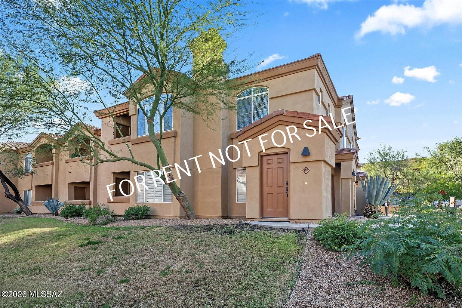 FURNISHED CONDOMINIUM AVAILABLE 10/01/2026 through 12/31/2026. Built 1996 2 BED 2 BATH 1084 SQ.FT.Welcome to this beautifully renovated, completely furnished condominium in the gated Pinnacle Canyon community in Northern Tucson. Offering 1,084 square feet of thoughtfully designed living space, this second-floor residence combines comfort, convenience, and a low-maintenance desert lifestyle with spectacular Catalina Mountain views. The open and inviting split-bedroom floor plan provides excellent privacy and an effortless flow between the kitchen, dining, and living areas ideal for both everyday living and entertaining. The spacious primary suite features a large walk-in closet, remodeled bathroom, and direct access to the covered patio. The north-facing patio is a peaceful outdoor retreat where you can enjoy the mountain views, natural light, and Tucson's beautiful desert surroundings, with an additional storage closet for convenience. The kitchen and living areas are filled with natural light and feature wood flooring throughout, with porcelain tile in the kitchen and bathrooms, creating a warm, comfortable, and stylish atmosphere. Pinnacle Canyon residents enjoy an impressive selection of resort-style amenities, including a heated pool and spa, clubhouse, fitness facility, BBQ areas, and beautifully maintained grounds. The location is exceptional directly across from shopping and numerous restaurants, and just minutes from Sabino Canyon, world-class golf, tennis and pickleball, and many of Northern Tucson's most desirable amenities. Pet subject to approval with additional pet rent & pet deposit. 

**Please visit our website for detailed information regarding the security deposit, applicable fees, and other important rental requirements.**