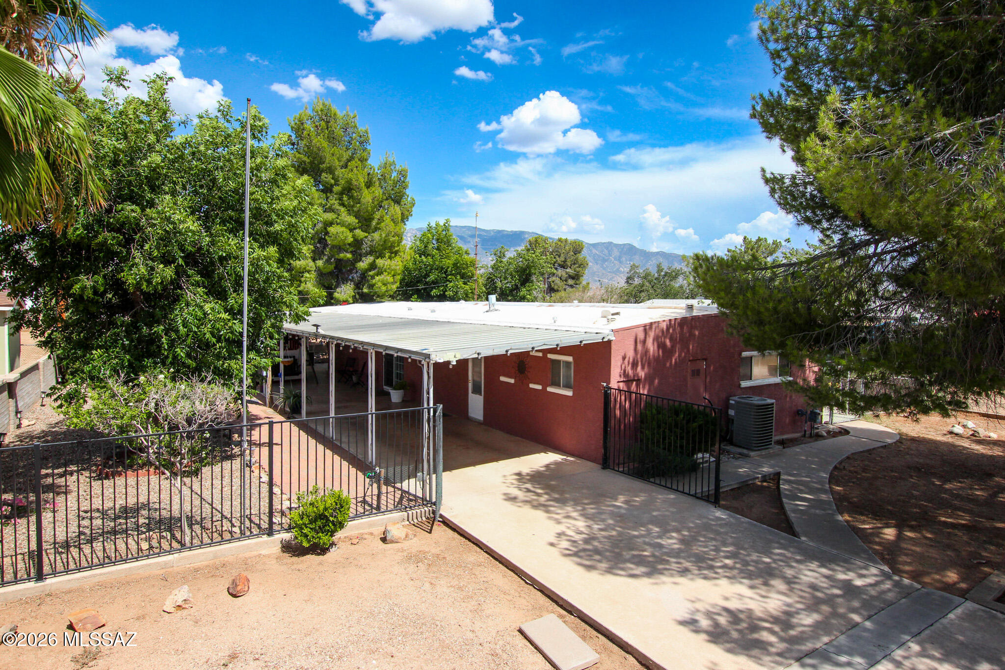 Welcome home! This beautifully maintained 2-bedroom, 2-bathroom residence in Catalina offers 1,440 sq. ft. of comfortable living space and unobstructed mountain views. The open-concept floor plan is filled with natural light and designed for seamless flow between the living, dining, and kitchen areas. Enjoy indoor-outdoor living with a covered patio and spacious yard, which provides ample space for entertaining, outdoor activities, or simply relaxing while taking in the surrounding scenery.