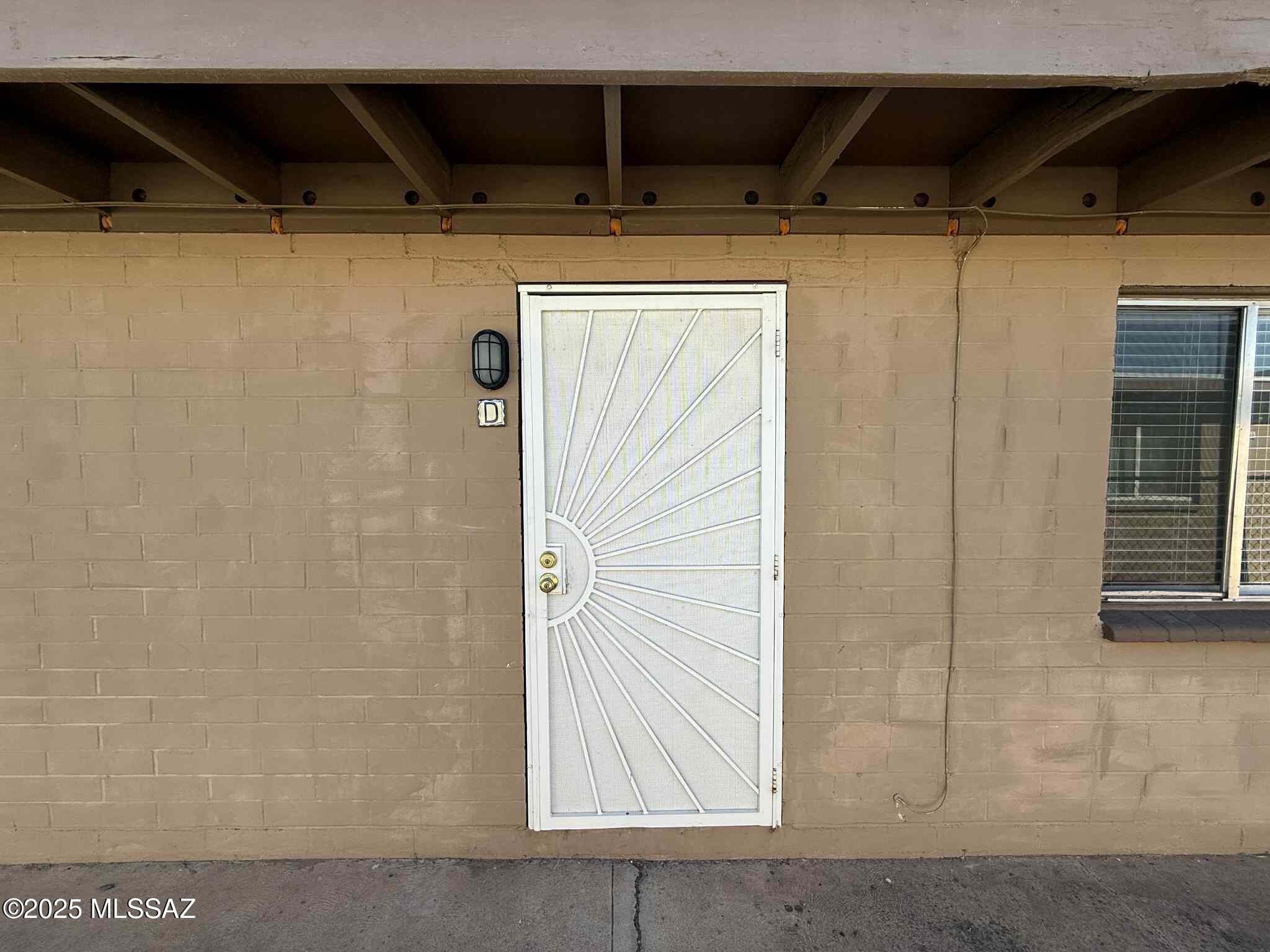 Charming 1BR/1BA apartment located in a small gated community in central Tucson. This cozy 500 sq. ft. unit is perfectly situated near Davis-Monthan AFB, shopping, schools, parks, and more. The home features tile floors throughout and vaulted ceilings. The kitchen comes equipped with a refrigerator and stove/oven. On-site coin-operated laundry is available for your convenience, and off-street parking is included. Pet-friendly, this home provides comfort and accessibility at an affordable price. Don't miss out, call today to schedule a viewing!