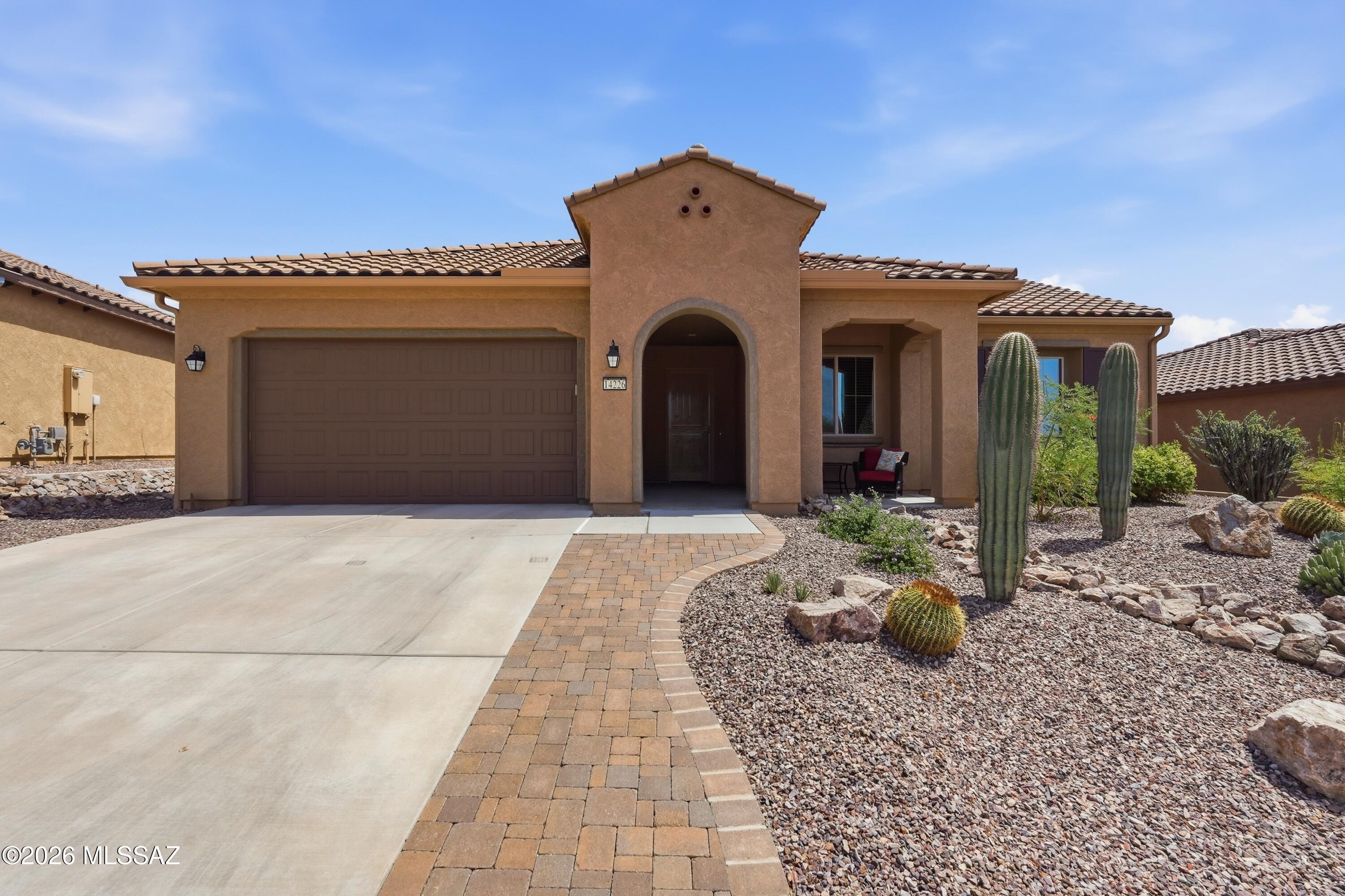 Can be purchased fully furnished! Experience a standard of luxury in this gorgeous residence situated inside Del Webb at Dove Mountain, Marana's highly acclaimed master-planned active-adult, 55+ community. Showcasing the popular Pursuit floor plan, this 2BD/2BA+Office/Den+Spool+Newer Roof+Newer HVAC and Exterior paint (2,033sqft) contemporary home delivers both style and functionality. Pass through the foyer to find a light-filled environment painted with a crisp, neutral color palette. The heart of the home is a premium gourmet kitchen. This culinary hub is anchored by staggered espresso cabinetry with convenient pull-out shelves, granite countertops, and a large central preparation island. The kitchen island features a stunning basketweave tile design below the breakfast bar area. Ceramic tile flooring sweeps seamlessly across the common areas, making way to carpet in the bedrooms. The practical floor plan ensures exceptional privacy for homeowners and visitors alike. The primary retreat functions as an expansive personal oasis, featuring dual vanities, an oversized walk-in shower with a built-in bench, and a roomy walk-in closet. Working from home or enjoying a creative hobby is a breeze thanks to a dedicated, independent den/office enclosed by stylish French doors. The great room transitions smoothly outdoors onto a deep covered back patio, and a yard with fantastic upgrades,(such as a spool and gas firepit) you will have to see to believe. Living in  Del Webb, Dove Mountain awards you direct access to an elite community recreation lifestyle. Residents enjoy a state-of-the-art recreation pavilion featuring a resort-style swimming pool, hot tub, tennis and pickleball courts, an active fitness room, and community social spaces. Balanced by nearby walking trails and premium dining at The Ritz-Carlton, Dove Mountain, this property is an absolute high-desert gem.
