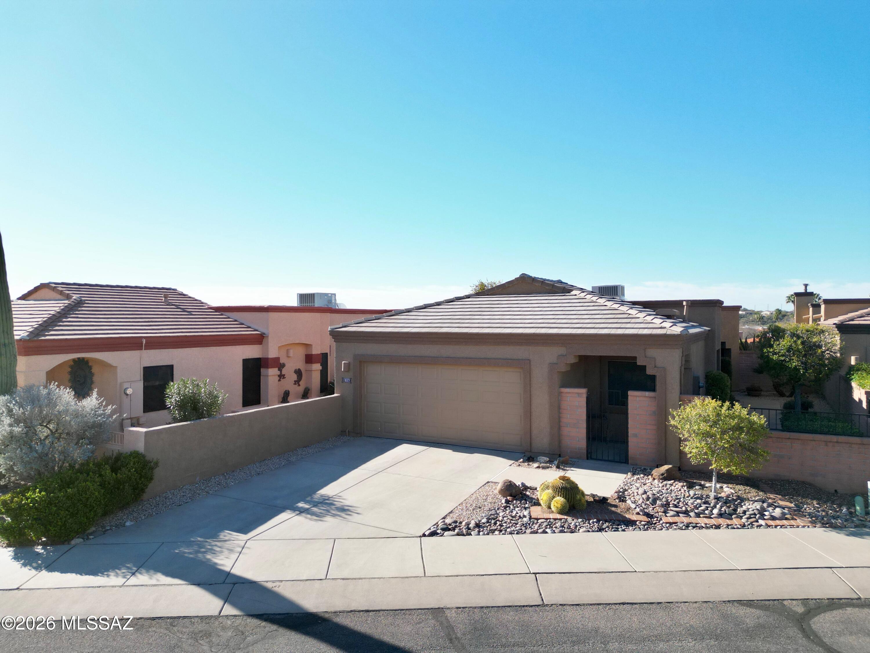 Located in picturesque San Ignacio Ridge this 1,722 square foot property features 2 bedrooms, 2 ½ baths and den configuration.  Spacious kitchen, all SS, newer cabinets, granite counters, range w Induction cooking surface, and open dining area with slider access to the screened porch and glorious mountain views. The large living area includes a dining alcove, foyer and large general area for entertaining and relaxing.  The large primary bedroom has a walk-in closet & the primary bath features newer cabinets, granite tops and walk-in shower.  Guest bedroom and bath with newer cabinets provide great accommodations for guests.  The bonus areas include the den and ½ bath making this home unique to other models.  The home is plumbed with PEX piping. New flat roof and tile installed in 2024.