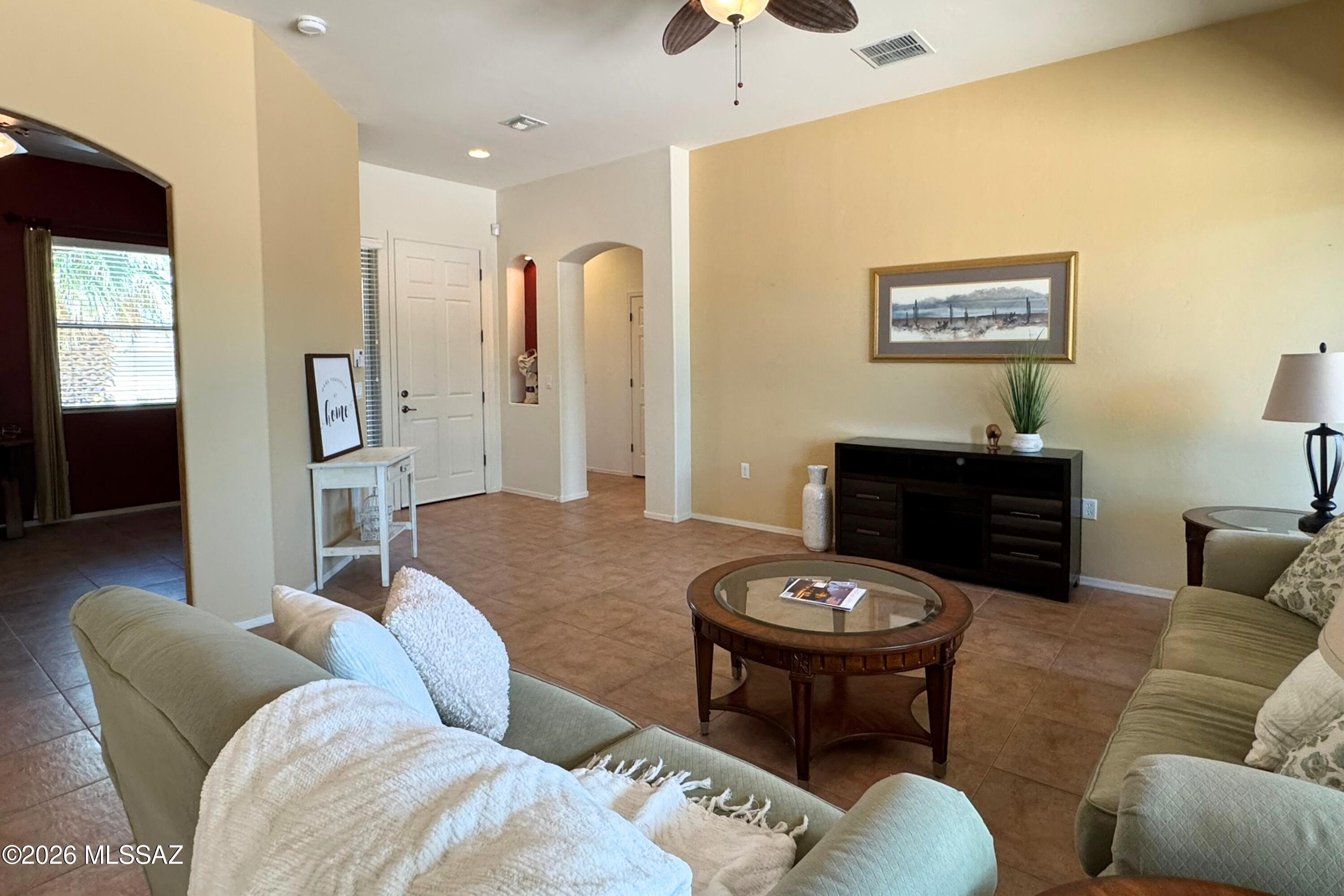 Discover your own desert sanctuary in this 2-bed + den home, perfectly positioned to back directly onto the West Desert trails. Wake up to quiet surroundings and exceptional birding right from your backyard--owners have documented more than 100 bird species on site. This is a rare opportunity to enjoy the beauty and serenity of the desert while staying connected to nature every day. Recent updates offer peace of mind for years to come, including a new roof (2024), windows (2023), exterior paint (2023), and HVAC (2018). Inside, the kitchen features solid granite countertops, 42'' upper cabinets, and convenient slide-outs in the lower cabinets for easy storage. A versatile den provides the perfect space for a home office, guest room, or hobby area, while the laundry room includes additional room for a small office or extra storage. The 2' garage extension adds valuable space for larger vehicles.
As a GVR member, you'll also enjoy access to pools, fitness centers, clubs, and a lively social calendar.