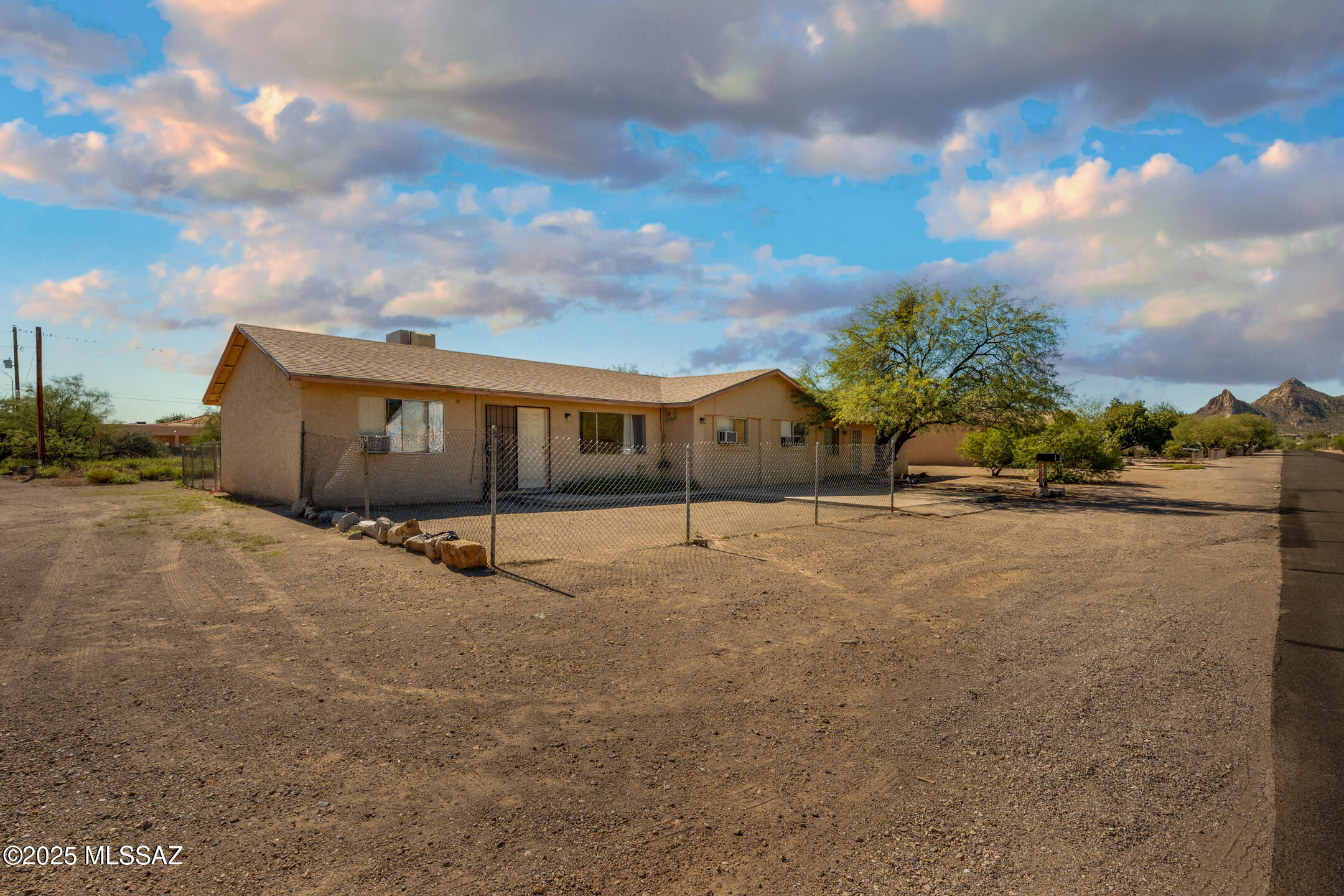Fantastic Investment Opportunity in Southwest Tucson! This duplex offers two 3-bedroom, 2-bathroom single-story units — perfect for investors or owner-occupants seeking rental income. One unit is currently tenant-occupied, providing instant cash flow, while the other is vacant and awaiting you or a future tenant! Each unit features a comfortable floor plan and an open kitchen. Enjoy a low-maintenance yard and convenient access to shopping, dining, and major roads for easy commuting. Whether you're expanding your portfolio or looking to live in one side and rent the other, this property offers great flexibility and potential in a growing area of Tucson! Your next chapter starts here!