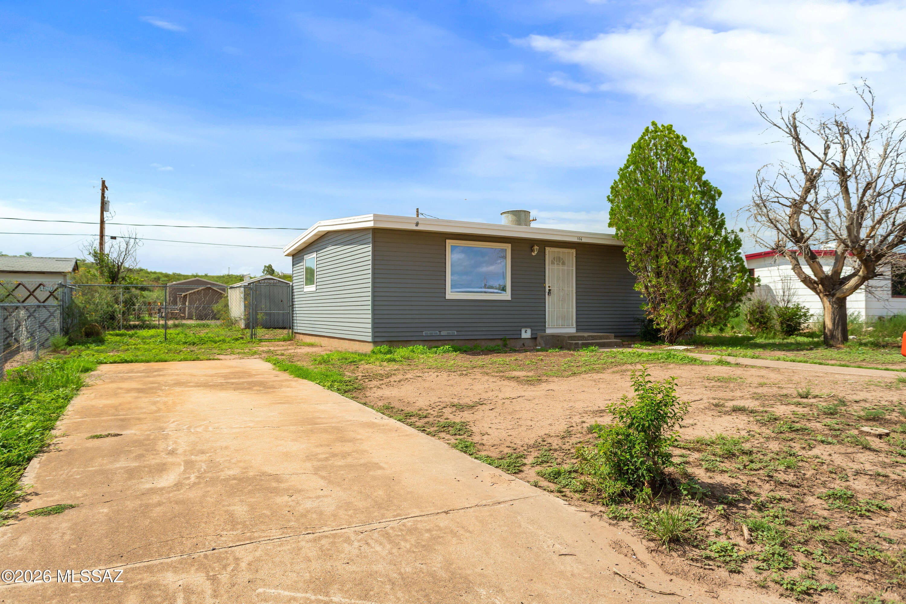 Affordable, yes! RV parking, yes! Dual pane windows, yes! Will it have AC, yes! Welcome to 106 E Apache st in lovely Huachuca City! This home has been lovingly updated with new paint new flooring a remodeled bathroom and kitchen. Cook up a nice meal on your gas stove and use up all the counter space theres plenty. Keep cool in the summer and warm in the winter with the exterior insulation under the sleek aluminum siding. Kick off your shoes and walk on the new laminate flooring and carpet throughout the home. Enjoy piece and quite in your new home!

AC/Heater will be installed with acceptable offer
prior to COE.
Owner/Agent