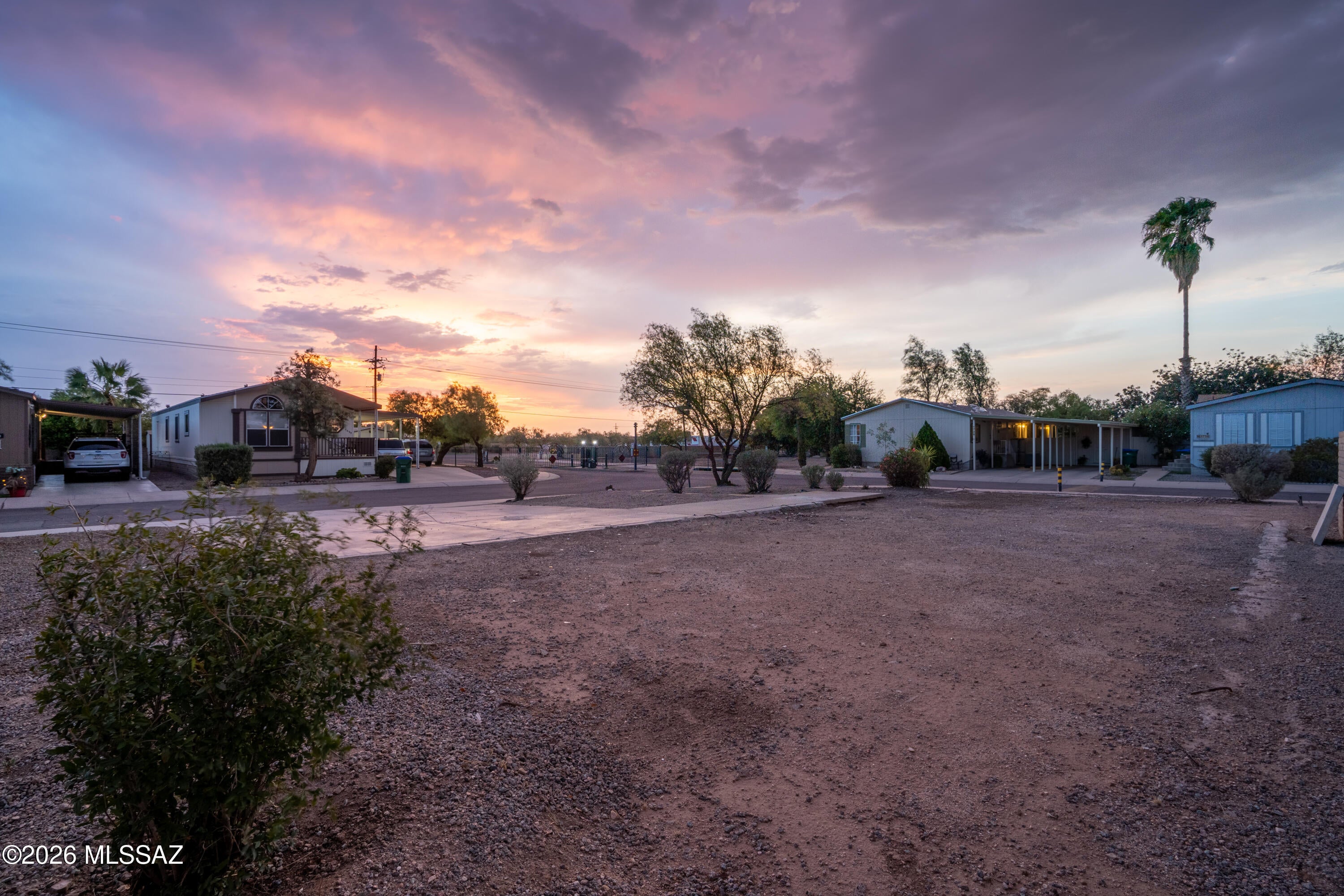 Place your manufactured home on the corner lot of this GATED, well-maintained community. This 0.09-acre vacant lot is designated for manufactured homes only, with all homes subject to HOA approval and community requirements. All utilities (water, gas and electric) are available on-site, including a sewer connection. Conveniently located near shopping, dining, and everyday amenities, this is a great opportunity for a primary residence, seasonal home, or investment. Typical sized manufactured home SIZES that should fit are: 28ft X 60ft or close to it. Buyer to verify all facts and conditions.