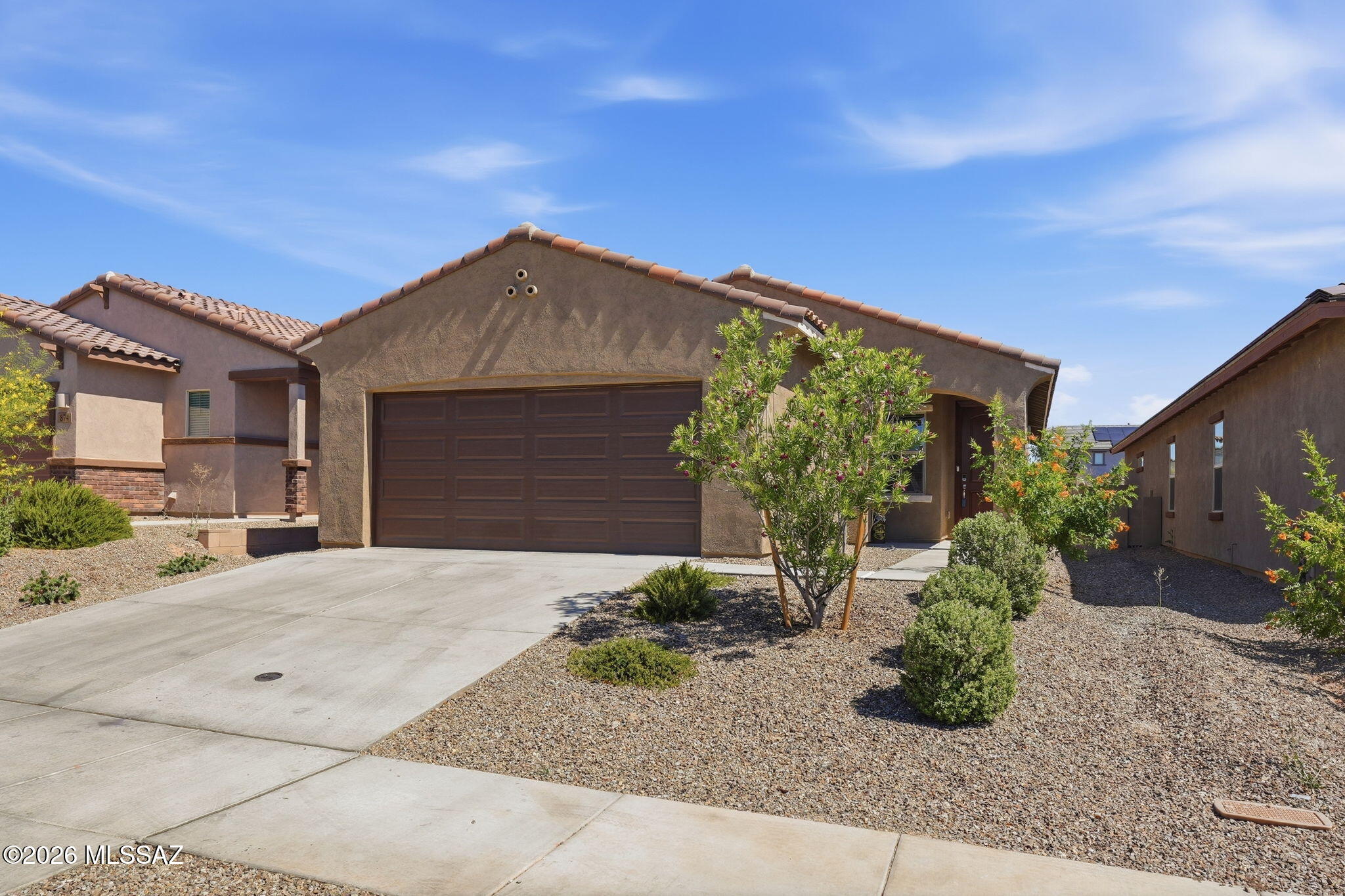 Welcome to your smart, stylish sanctuary in Sahuarita! This delightful three-bedroom, two-bathroom home blends modern technology with everyday comfort. Google Nest integration and automated blinds let you control your environment with effortless ease. The open floor plan flows beautifully into a kitchen that practically begs you to bake cookies -- complete with a generous island and gleaming stainless steel appliances. Nestled near Parque la Coraza and Sahuarita Middle School, this location offers convenience the whole family will appreciate. Whether you're a tech enthusiast or a cookie connoisseur, this home delivers. Schedule your showing today!