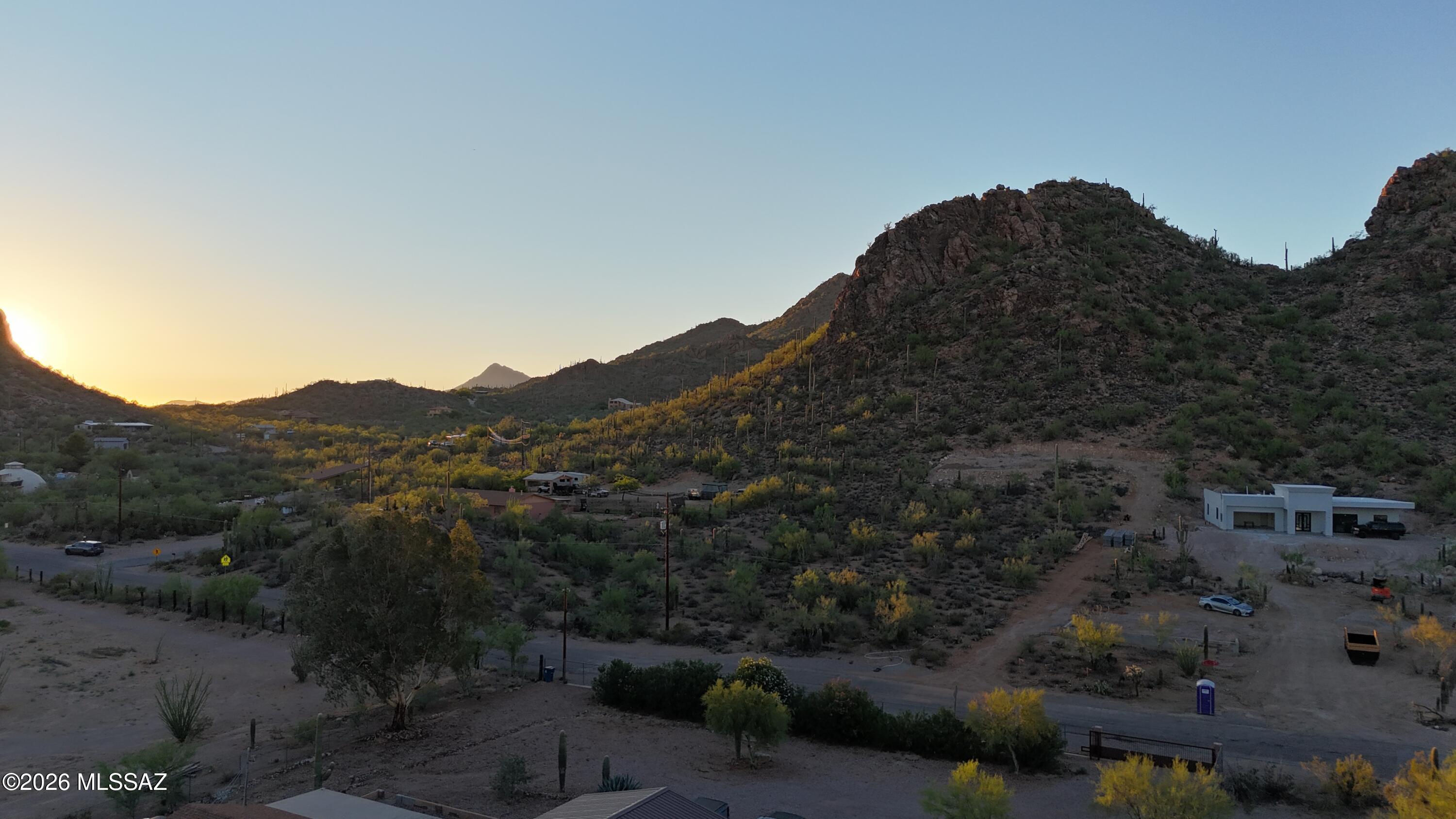 Don't miss this beautiful 3.18-acre parcel with incredible Arizona sunset views and plenty of room to build your dream home. Located in a great area with paved roads and easy freeway access, you'll enjoy the perfect balance of peaceful desert living while still being just minutes from shopping, restaurants, and Casino Del Sol Resort.

The property has a water line with meter installed and utilities are already at the lot line. Just install a septic system and you're one step closer to building. Whether you're looking for a custom homesite or a smart investment, this property offers the space, convenience, and views you've been looking for. Buyer to verify all facts.