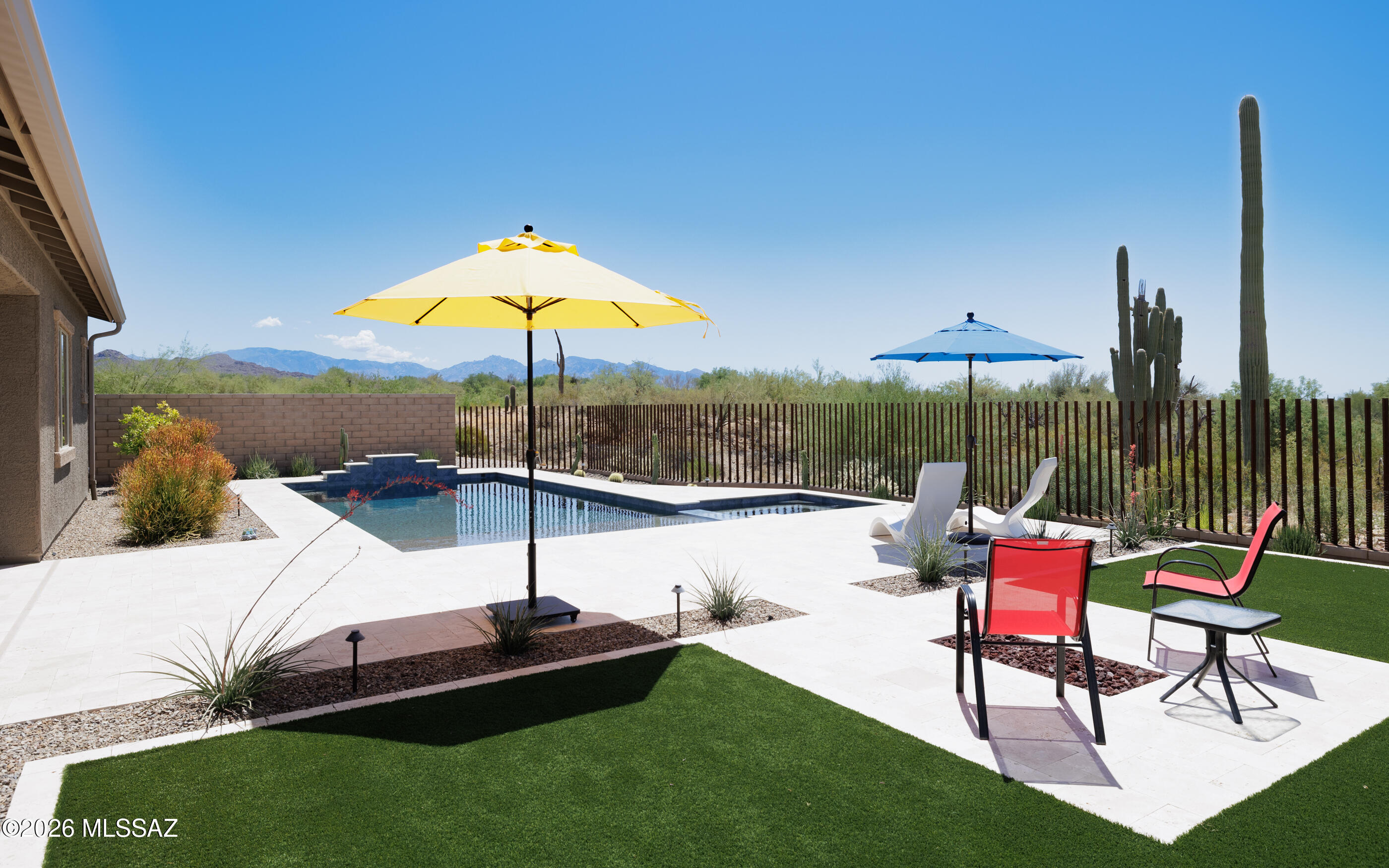 Extraordinary outdoor living!  Fabulous saltwater pebble-tec pool w/extra deep plunge end (8ft depth) + Baha shelf & jump platform + in-ground conventional spa and gas fire-pit sitting area . Surrounded by nature and mountain views- a superb location w/an outstanding backyard. Home has been barely lived in. Some high end finishes and additions have been added to this home such as the great room Home Theatre System by Area 51 and full wall build-ins for equipment/storage. The Next-Gen living quarters provides extreme privacy for guests or family. A truly fabulous value and move in ready. 3 garages - 4 bedrooms - 3 baths - pool, spa, gorgeous backyard and outstanding views on a quiet street. Call to schedule a private showing.