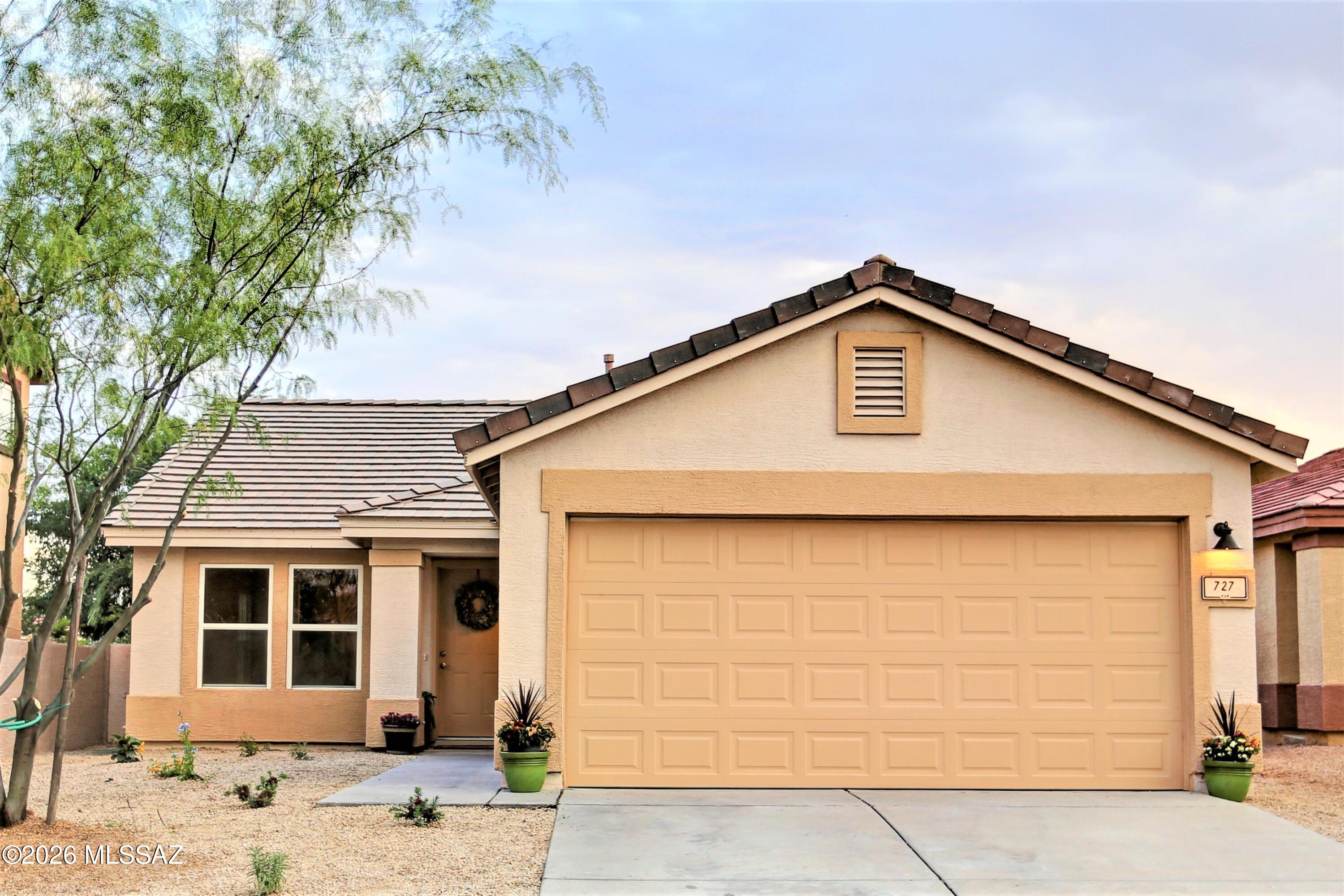Nestled in the highly sought-after Rancho Vistoso community, this beautifully maintained 3-bedroom, 2-bath home offers comfort, style, and an unbeatable Northwest location. Connecting to the cozy living room is an eat-in kitchen featuring granite counters, stainless steel appliances, and a classic subway tile backsplash. Thoughtful upgrades throughout include newer A/C, updated blinds, and tile flooring in the kitchen and bathrooms. The primary bedroom  offers a full bathroom and walk-in closet for added convenience. Step outside to enjoy the low-maintenance, professionally landscaped backyard backing to common space for enhanced privacy. Conveniently located near parks, bike trails, shopping, dining, and more -- this home truly has it all. Owner is licensed to sell real estate in Arizona.