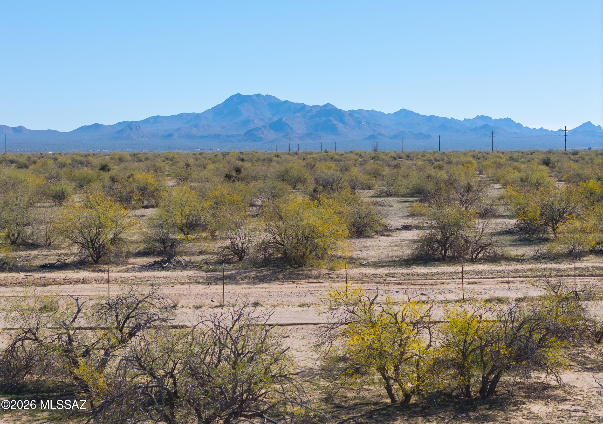 A rare opportunity to own 8.5 acres of desert beauty with panoramic mountain views, and spectacular sunrise and sunset skies! This corner lot is ideal for a custom dream home, offering privacy, space, and stunning natural surroundings. Create your own desert sanctuary with room for a home, casita, RV garage, or workshop — all while enjoying peaceful country living and endless Arizona skies.