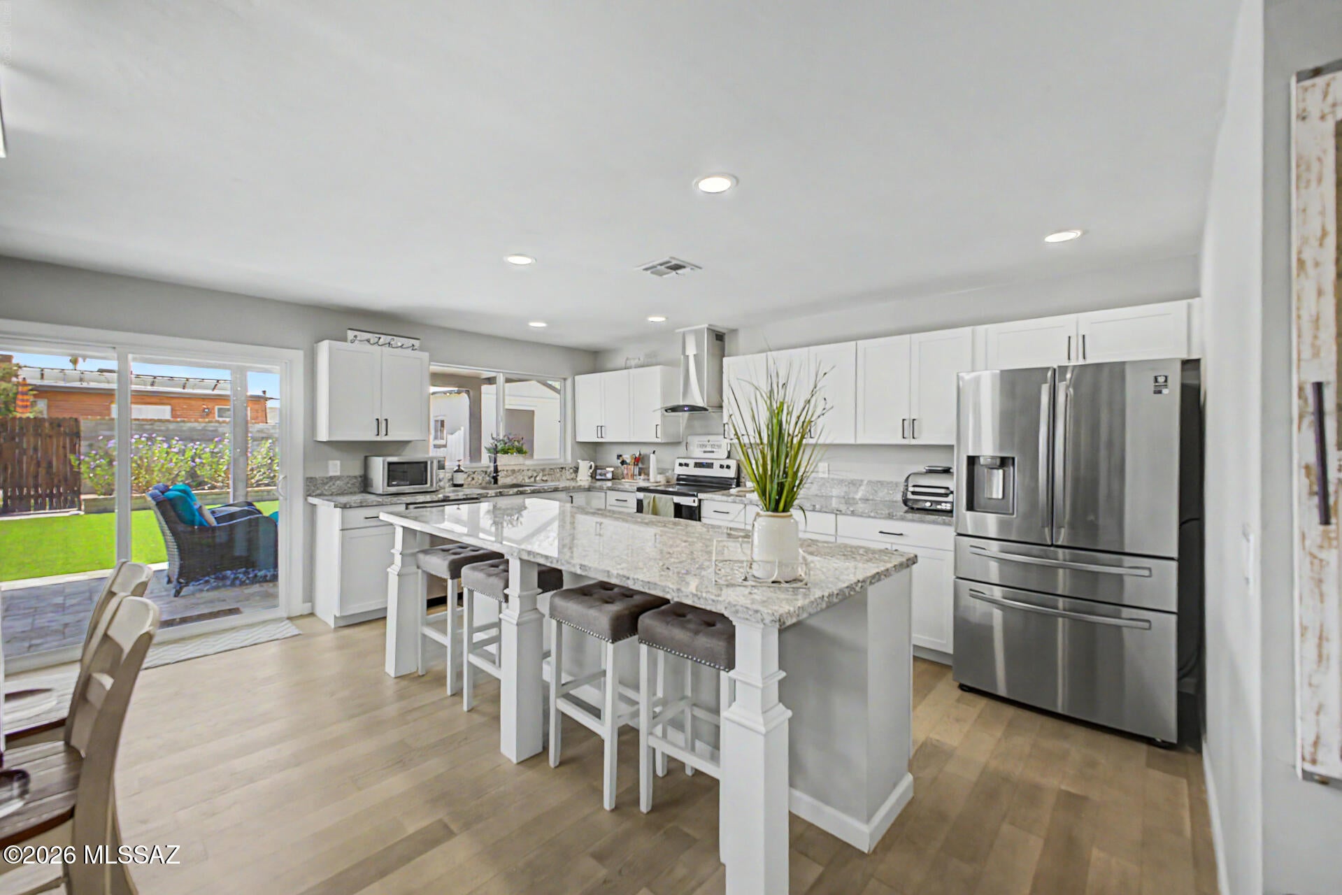 *Seller will consider offers between $410,000-$425,000*Exquisitely Remodeled Single-Level Home w/Split-Bedroom Layout Located in Quiet Central Neighborhood w/Mountain Views Offering 4 Spacious Bedrooms & 3 Luxurious Baths (Including 2 En-Suites). Welcoming Foyer Leads to Huge Open Great Room & Dining Area. Kitchen Boasts Oversized Island w/Ample Seating, Granite Counters, Stainless Steel Appliances & Plenty of Cabinets. New Wood Flooring & Carpet, New Fixtures, Lighting, Water Heater, HVAC, Ceiling Fans+Fully Remodeled Kitchen & Baths All in 2021. Third Bathroom Added in 2025 w/Same Custom Tile & Finishes. Plenty of Room for Enjoyment in the Large Backyard w/Covered Patio, Extended Pavers & Artificial Turf. Storage Shed & Room for RV or Trailer Behind RV Gate. No HOA! Buyer to verify SqFt.