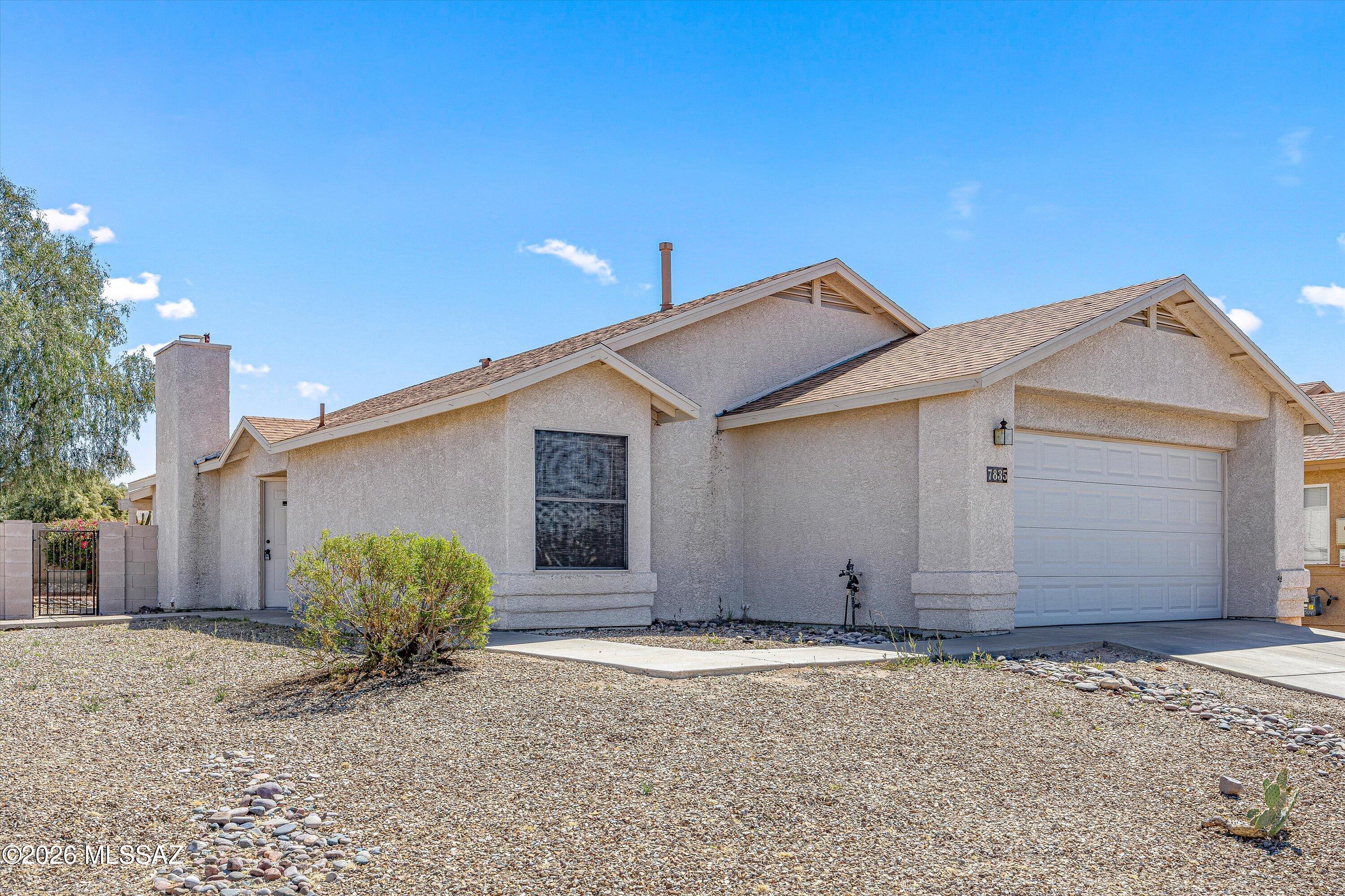 Excellent price for this 3 bedroom, 2 bath, home with newer HVAC and roof.  Living room with fireplace. Large corner lot, covered patio, extended patio pavers. Great Vail schools, shopping, restaurants  and parks nearby.  No HOA in this subdivision. Needs some cosmetic TLC to make it your perfect home
