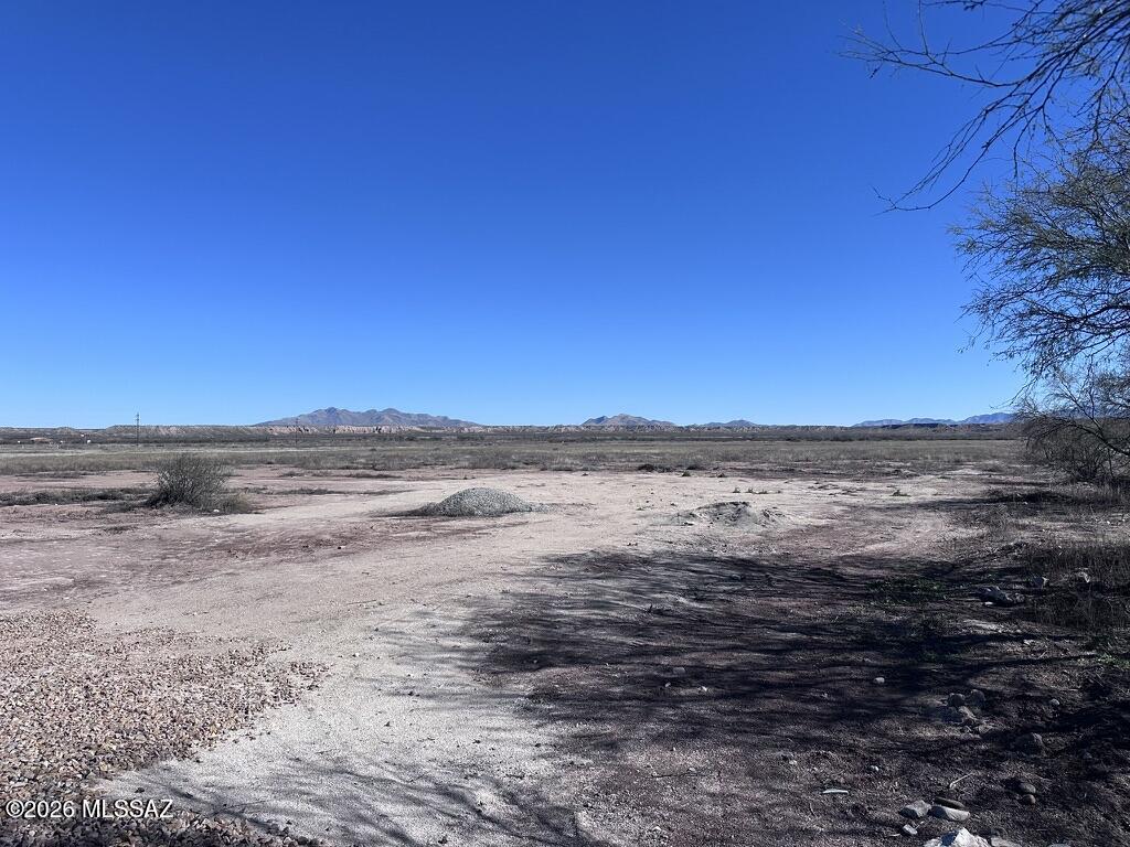 *LOT D* Rare opportunity to own acreage in the quiet Pomerene area, offering excellent potential for custom home construction or a small builder/investment project. These five lots are located on a developed cul-de-sac just off Colony Road, providing privacy, functionality, and an efficient layout. Electric and water are available to the lot lines, reducing upfront development costs. Access is provided by a gravel road, and a new survey has been completed. Tax records currently reflect the original parcel and do not yet show the recent lot configuration. Whether you are looking to build a thoughtfully designed custom home or capitalize on a multi-lot opportunity for future homes, this property offers flexibility, open space, and peaceful rural surroundings with convenient access to town.