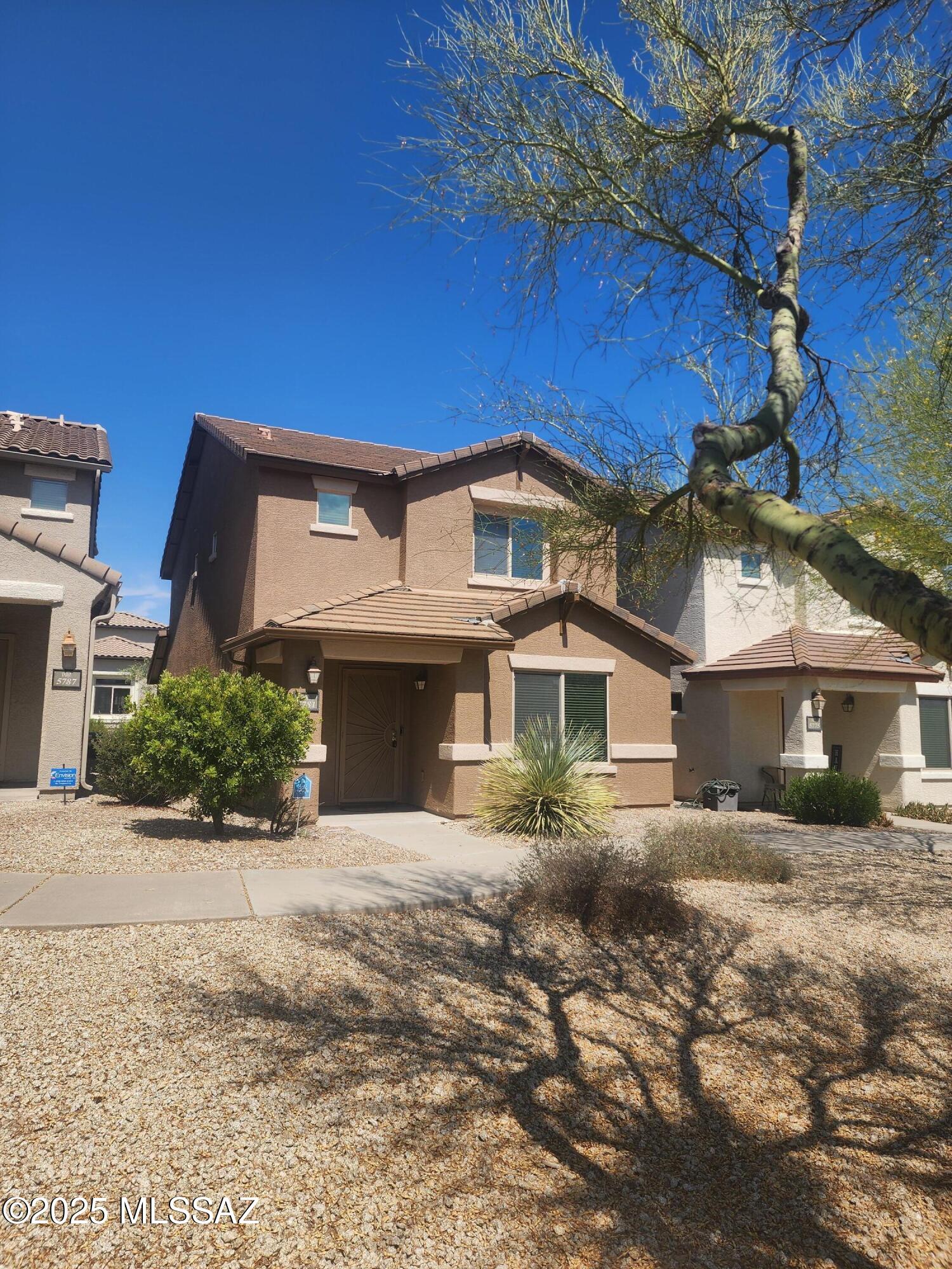 Live the resort lifestyle in Sierra Morado! This updated 3-bed, 2.5-bath home (with 2-car garage) is located in the TOP-RATED Vail School District and features almost new luxury vinyl plank flooring, tile downstairs, and tons of natural light. Enjoy community perks like a RESORT-STYLE POOL, sports courts, playgrounds, and more - right across the street! Washer/dryer included as-is. Plenty of guest parking! AVAILABLE NOW - Act fast, homes here go quick! Easy access to I-10 and Davis Monthan AFB. Pets allowed, ask about deposit/fee and restrictions. Message today to schedule a tour! Photos may be from a prior vacancy and will be updated when possible. Do not disturb the occupant. Call for a viewing.