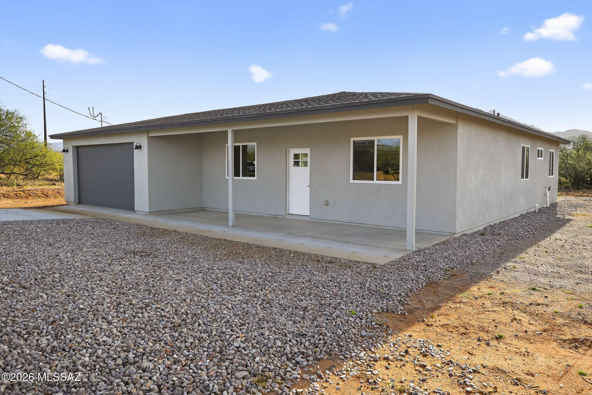 This newly constructed ranch style 3 BDRM/2BTH home nestled on oversize corner lot is designed as a blank canvas. Open-concept layout, and neutral finishes throughout, each space is ready to be imagined, styled, and personalized.Virtual staging and landscaping images are included to help envision the possibilities! Kitchen is a chefs dream featuring quartz countertops, custom cabinetry & seamless flow into the dining & living areas! Enjoy panoramic Mountain views, and wide open skies while sipping your coffee on the front porch, or hosting family gatherings under the stars! Truly a MUST SEE!