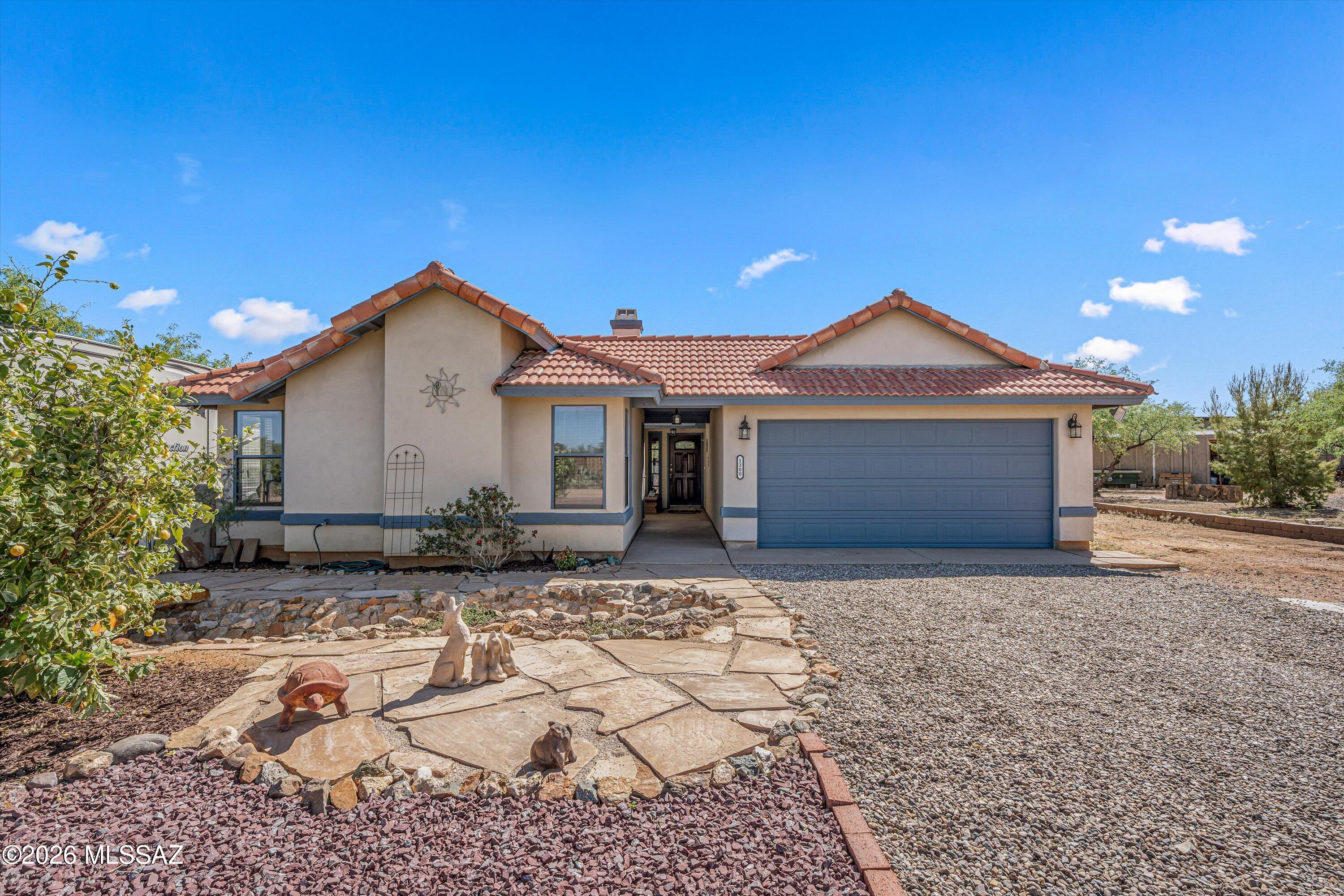 Well maintained home in desirable Vail School District on acre plus lot.  Large back covered patio.  Additional large, separate 24 x 40 RV garage with 12'' door, side doors, windows & electric power for workshop area.  Additional RV parking adjacent to house.  Very short distance to paved road.  Minutes from I-10, shopping, restaurants & stores.  Assumable 3.5% VA mortgage to qualified buyers.